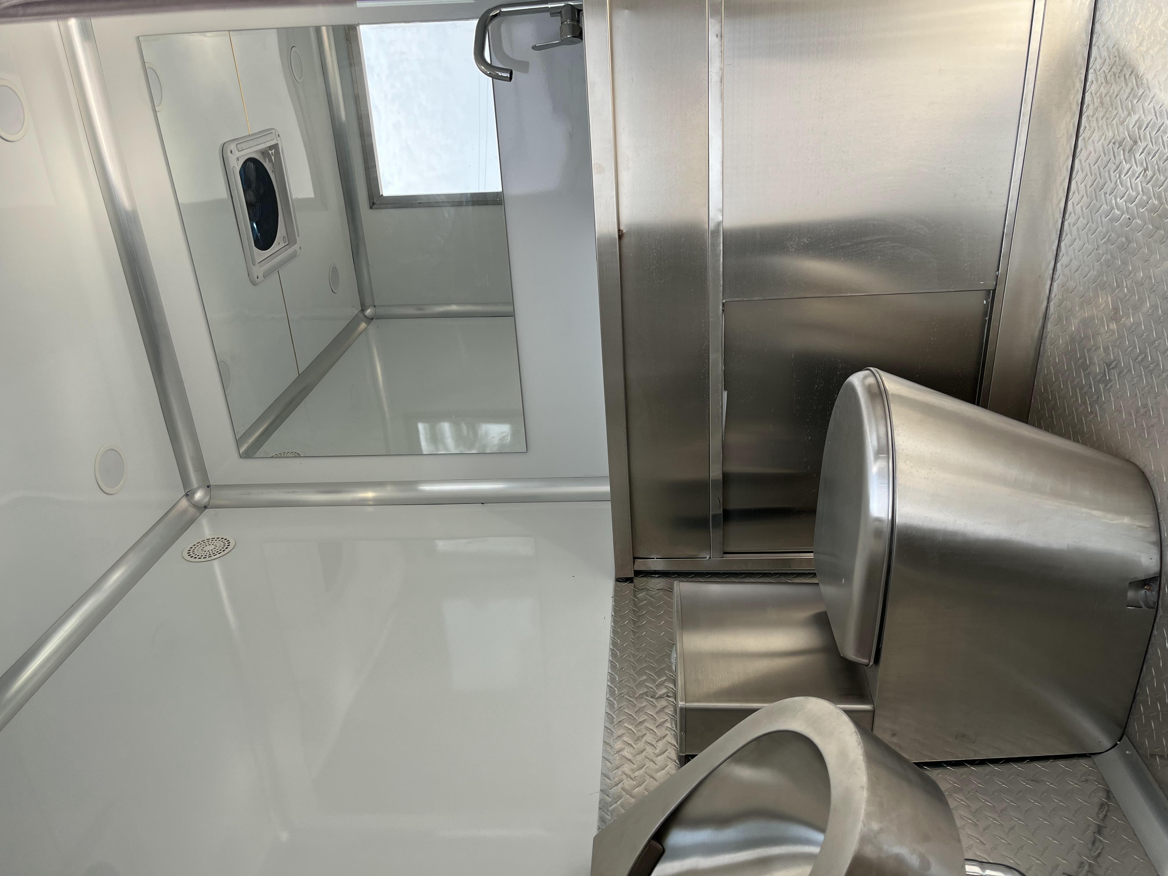 Blue Portable toilet trailer
