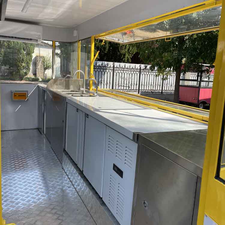 Yellow four-wheel portable food truck trailer