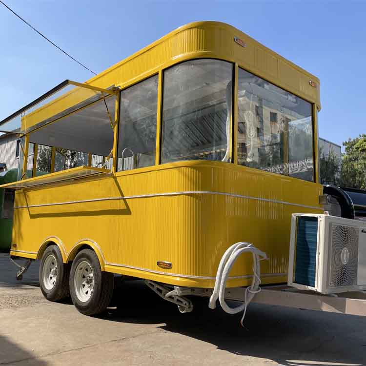 Yellow four-wheel portable food truck trailer