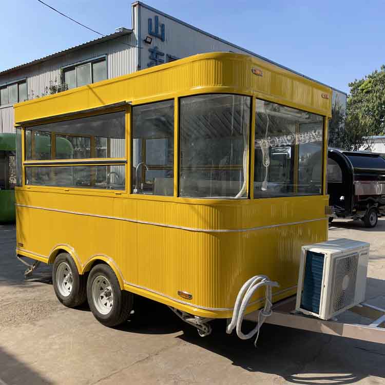 Yellow four-wheel portable food truck trailer