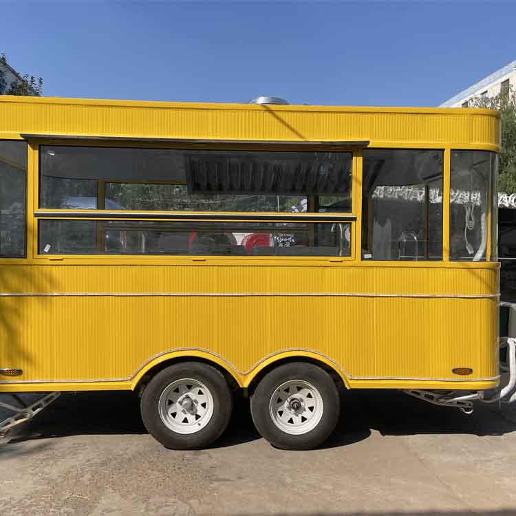 Yellow four-wheel portable food truck trailer