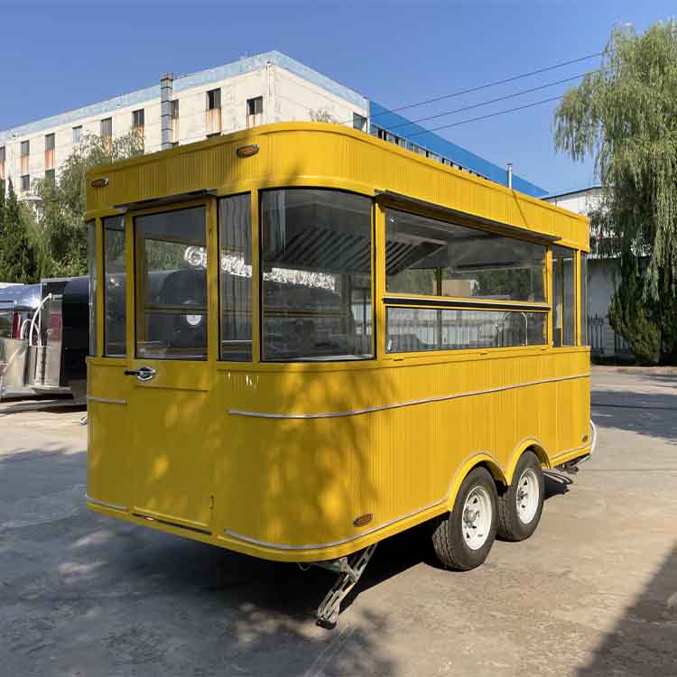 Yellow four-wheel portable food truck trailer