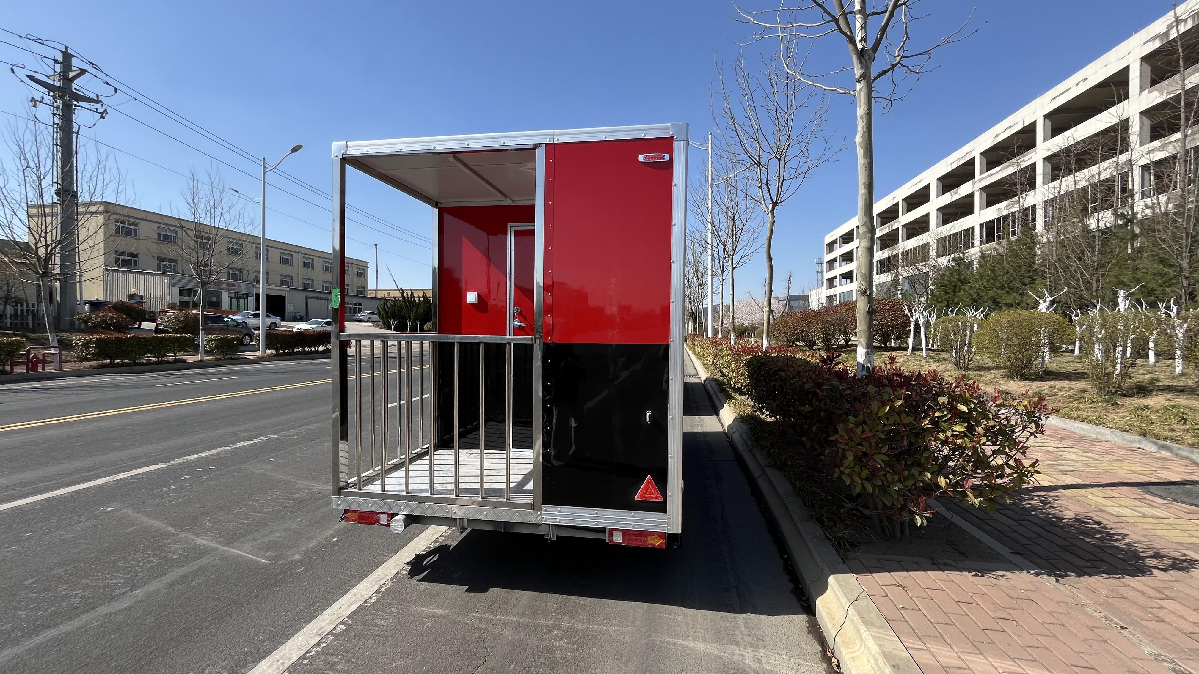 Portable black and red trailer