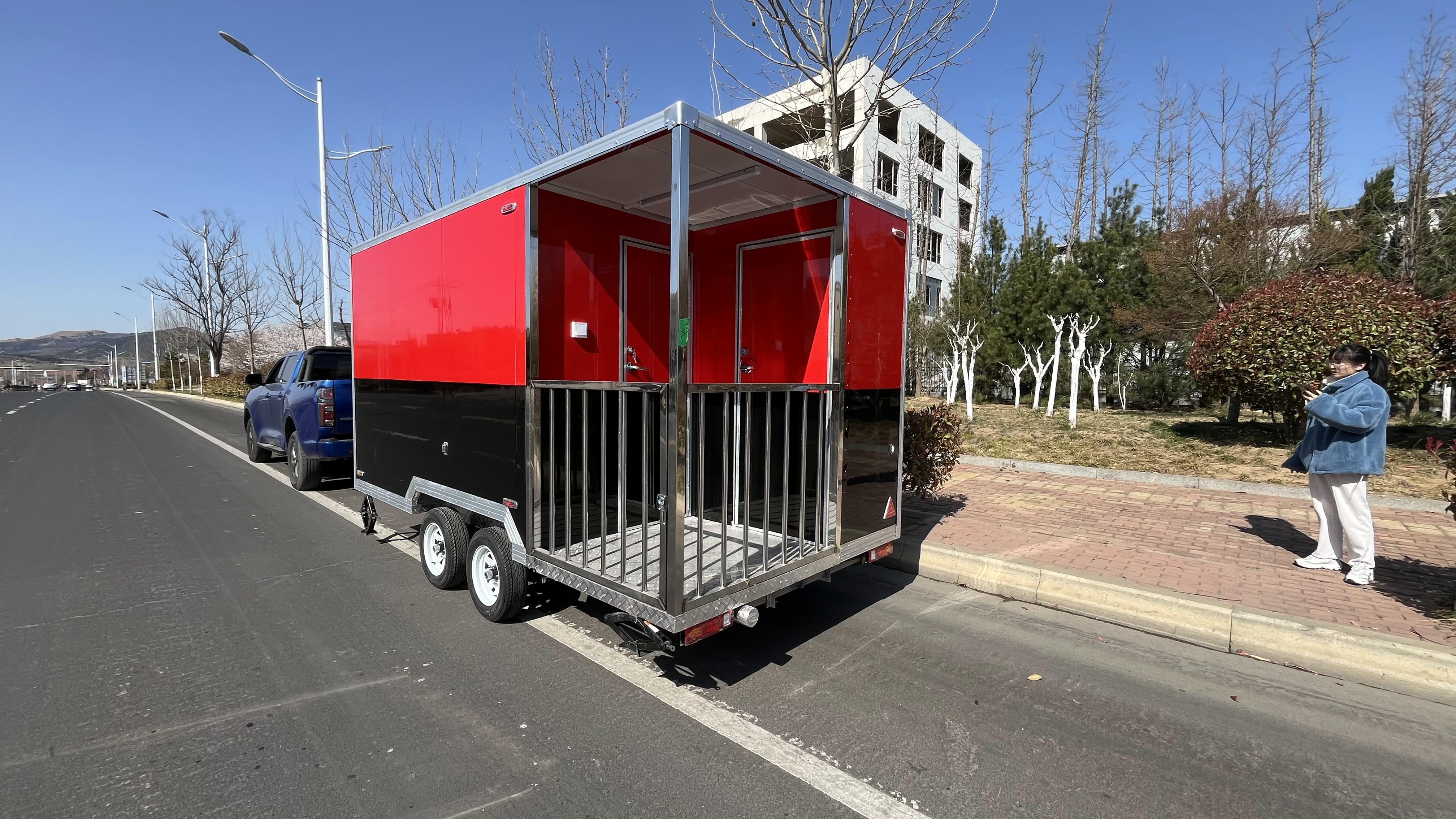 Portable black and red trailer