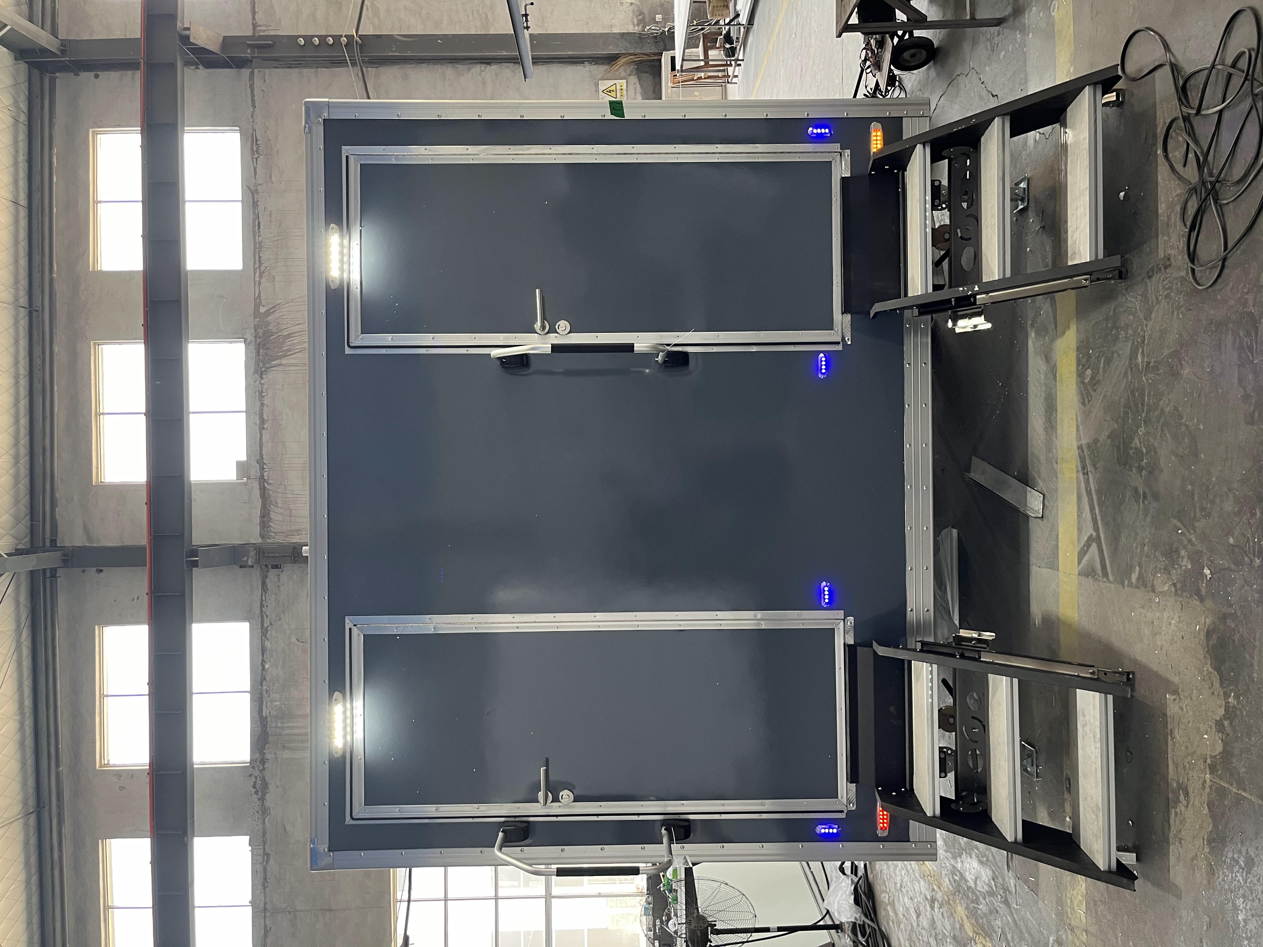 Mobile trailer with double toilet compartments and grey lightweight body