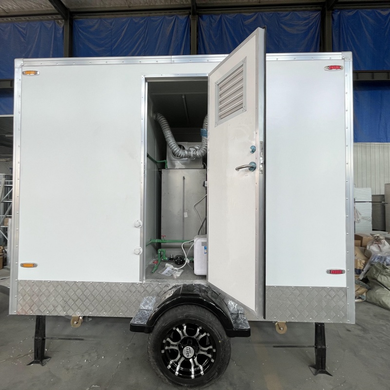Two 3-meter portable toilet trailers