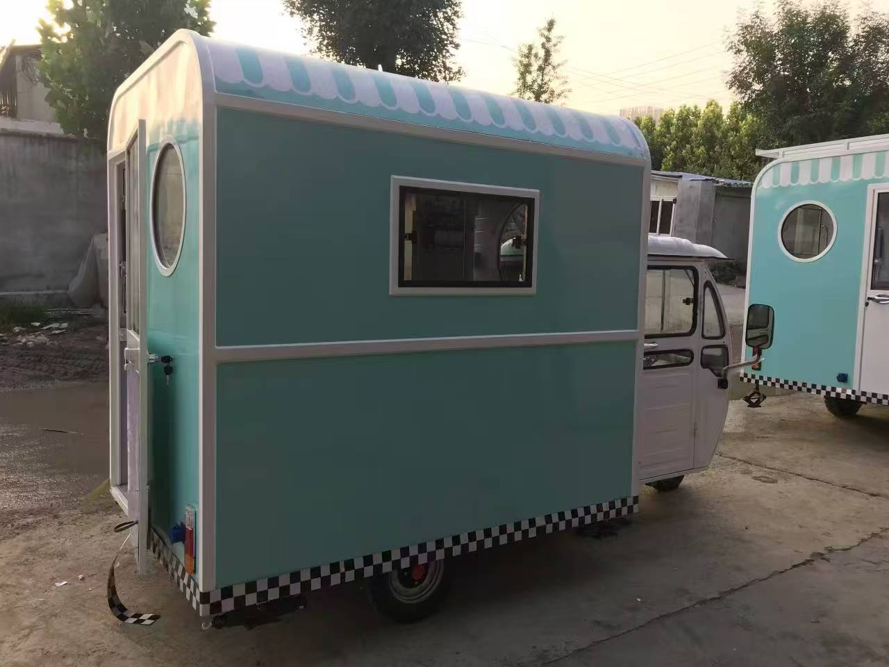 Blue and white three-wheeled food truck: A mobile and refreshing food station
