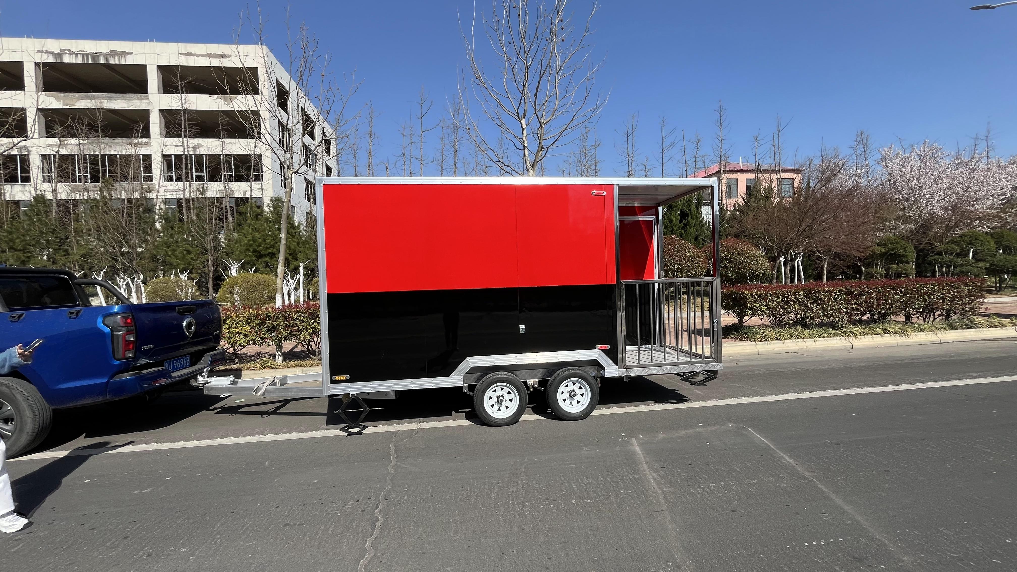 Portable black and red trailer