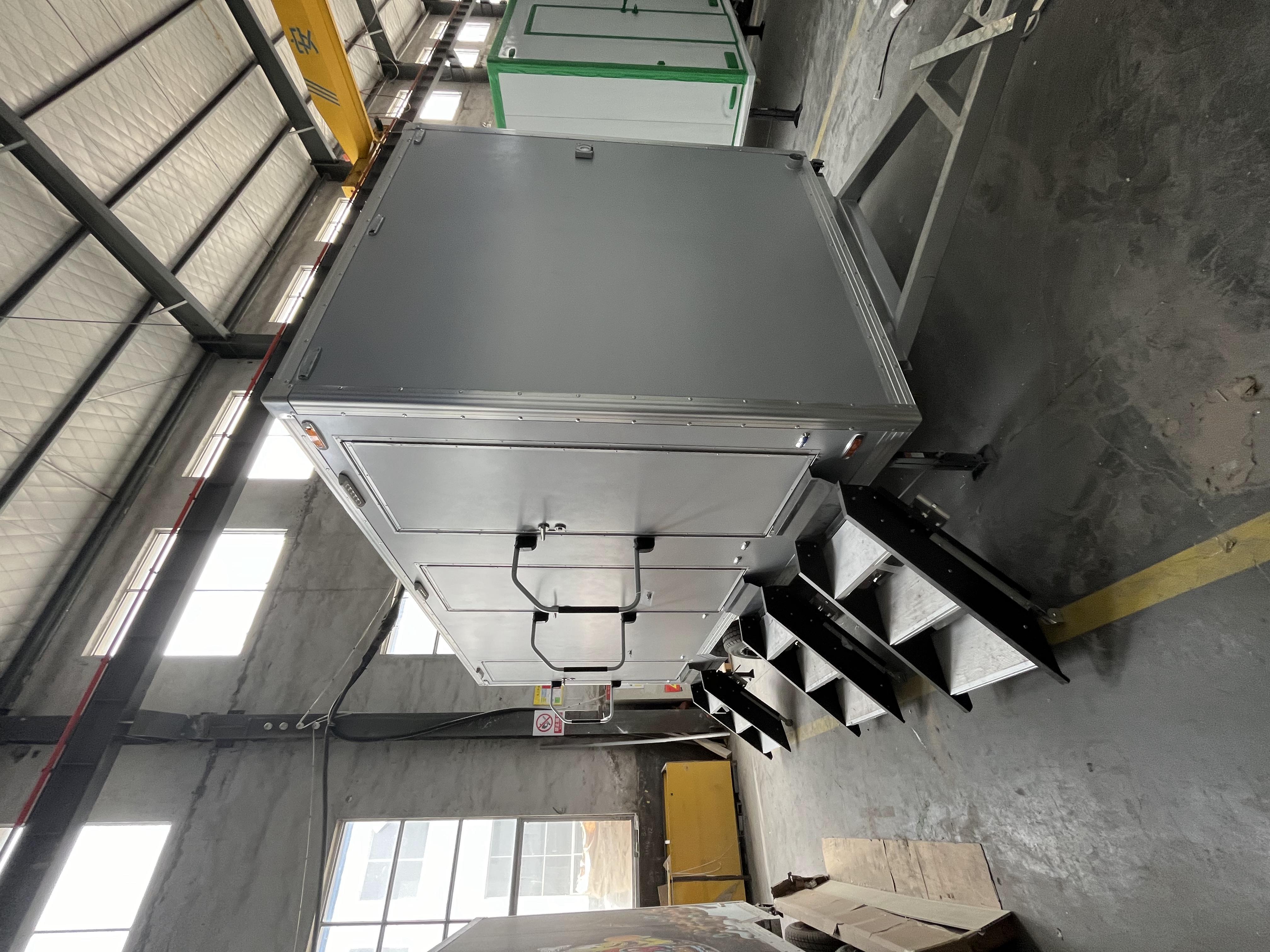 Grey movable three-toilet trailer