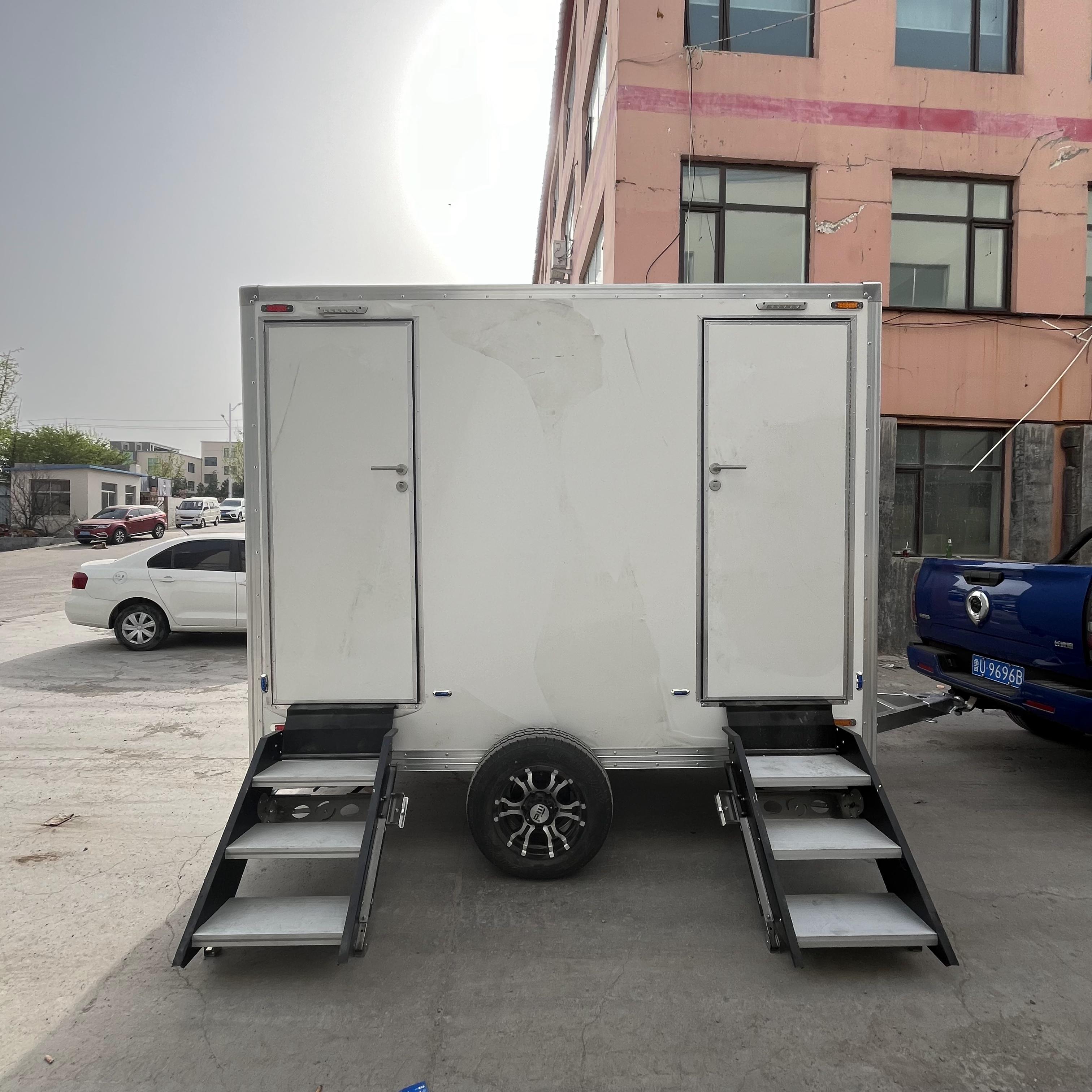 Two white portable toilet trailers: sturdy and durable, easy to move, creating a comfortable toilet experience.