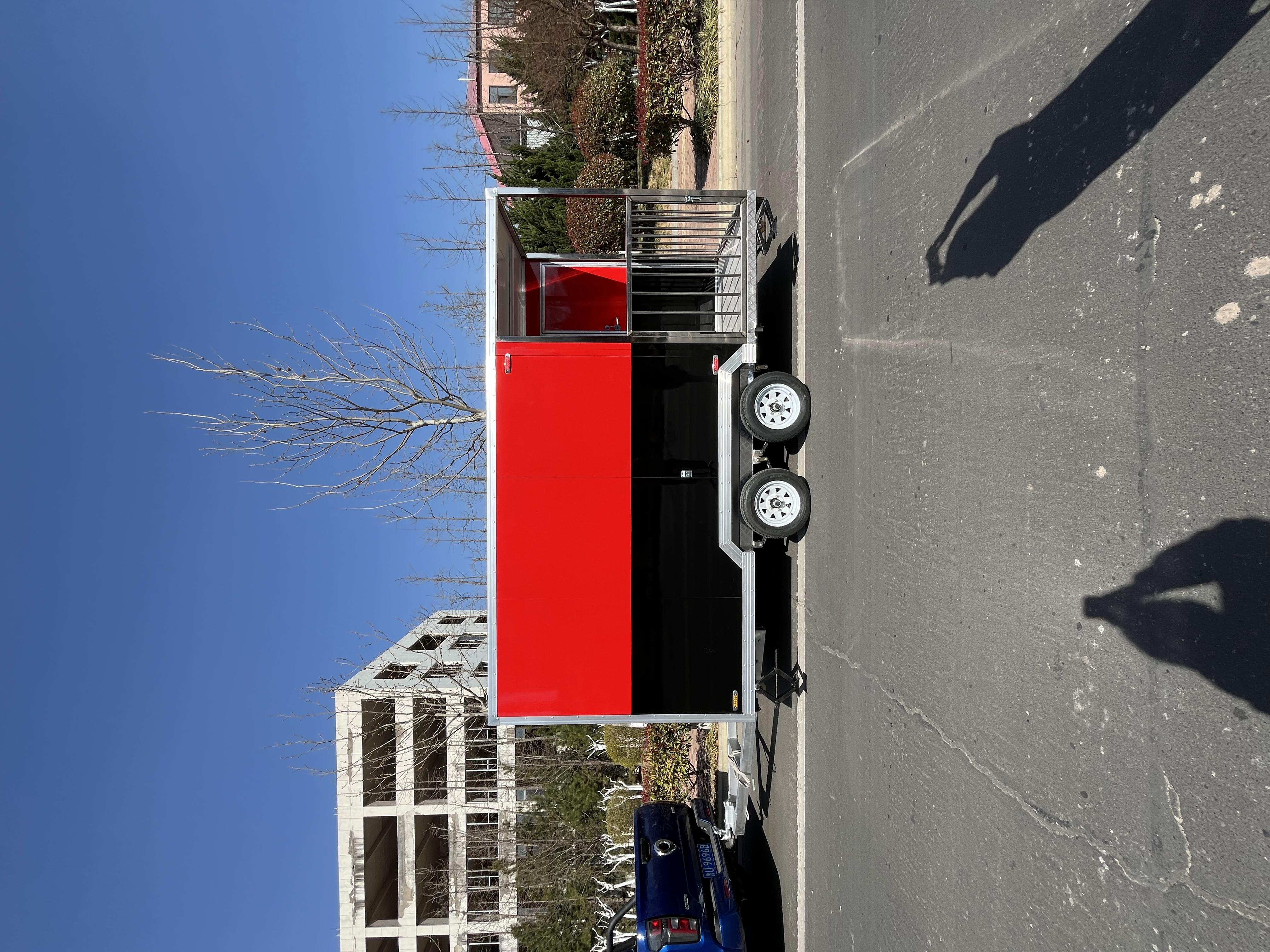 Portable black and red trailer