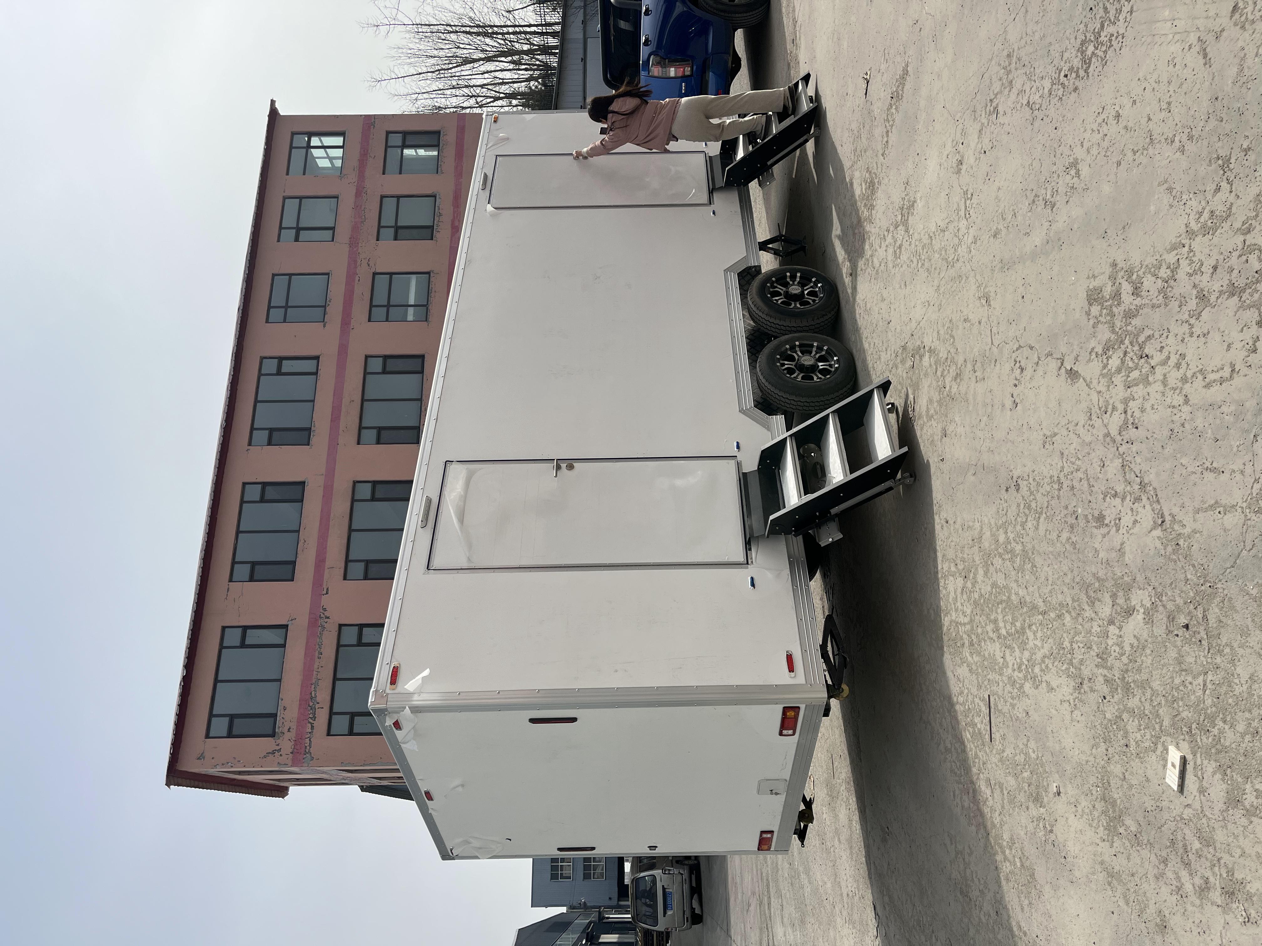 Two portable large white toilets