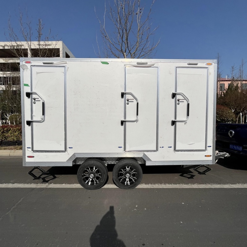 Three white trailer toilets, movable "sanitary fortresses", firmly safeguard cleanliness