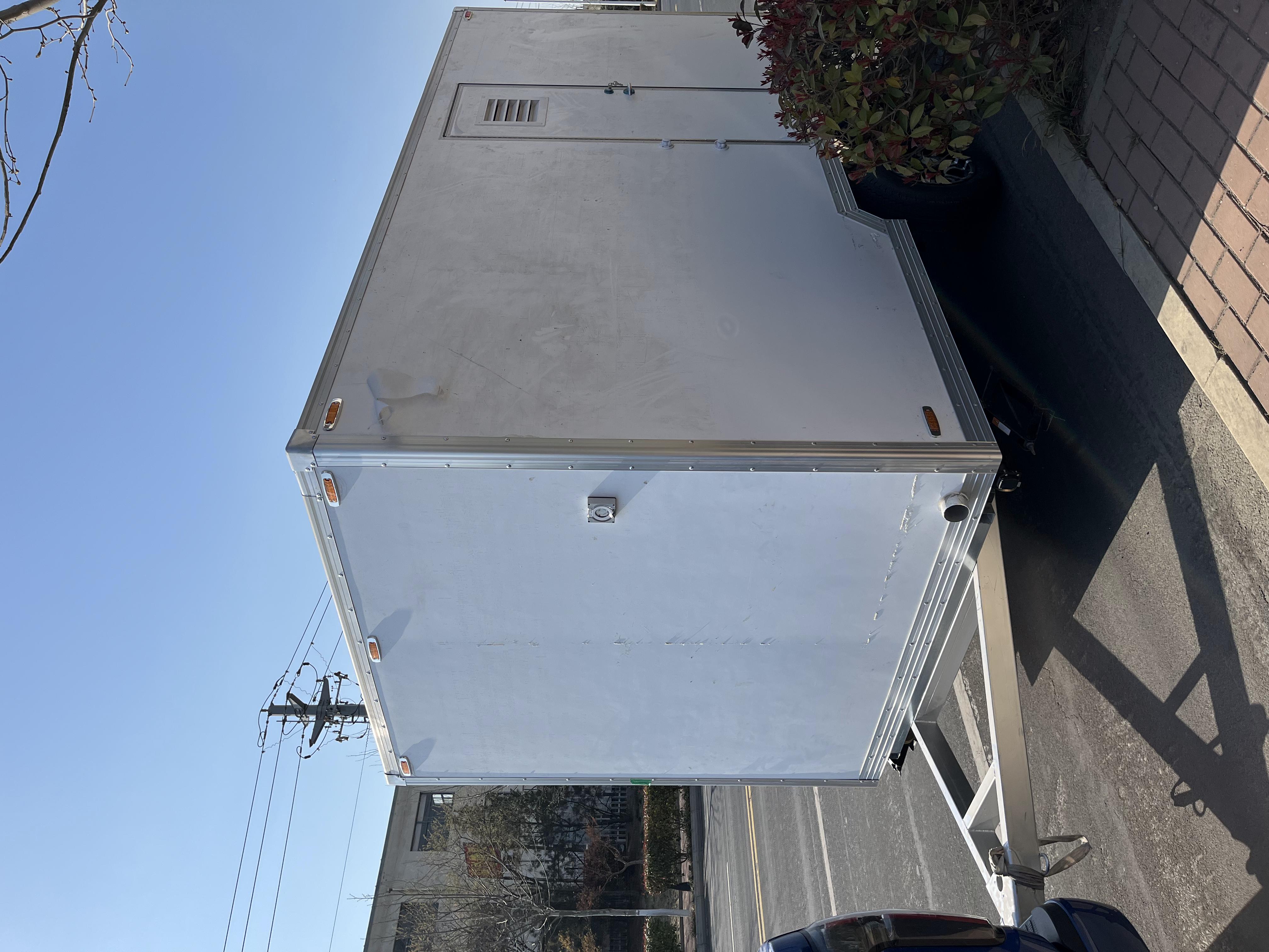 Three white trailer toilets, movable "sanitary fortresses", firmly safeguard cleanliness