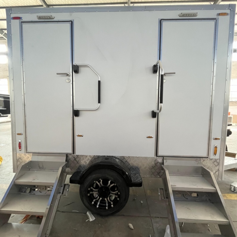 Two 3-meter portable toilet trailers