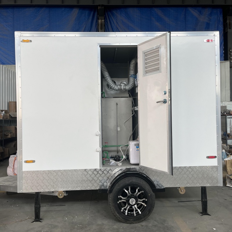 Two 3-meter portable toilet trailers
