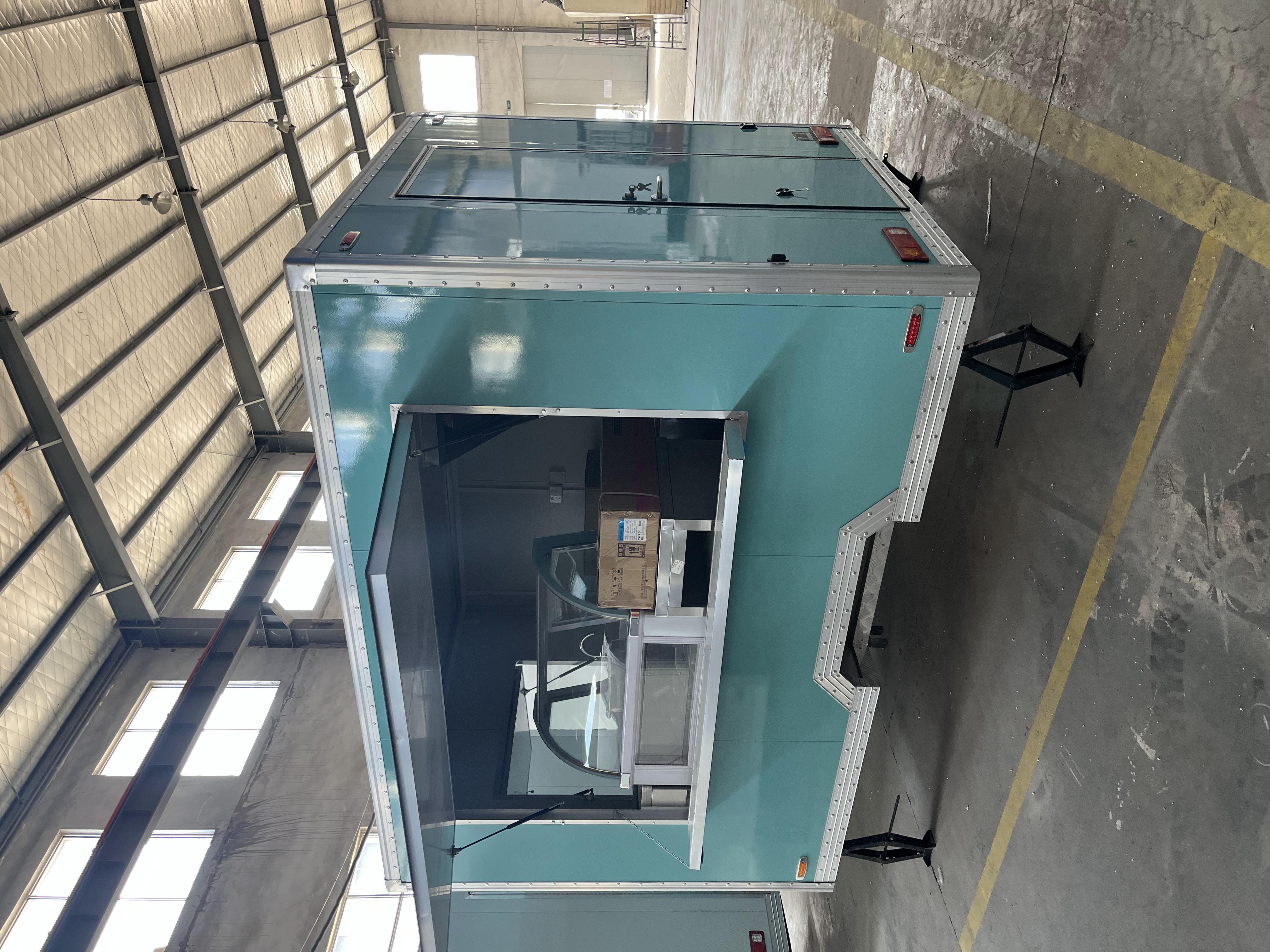 Blue-green retro food truck trailer