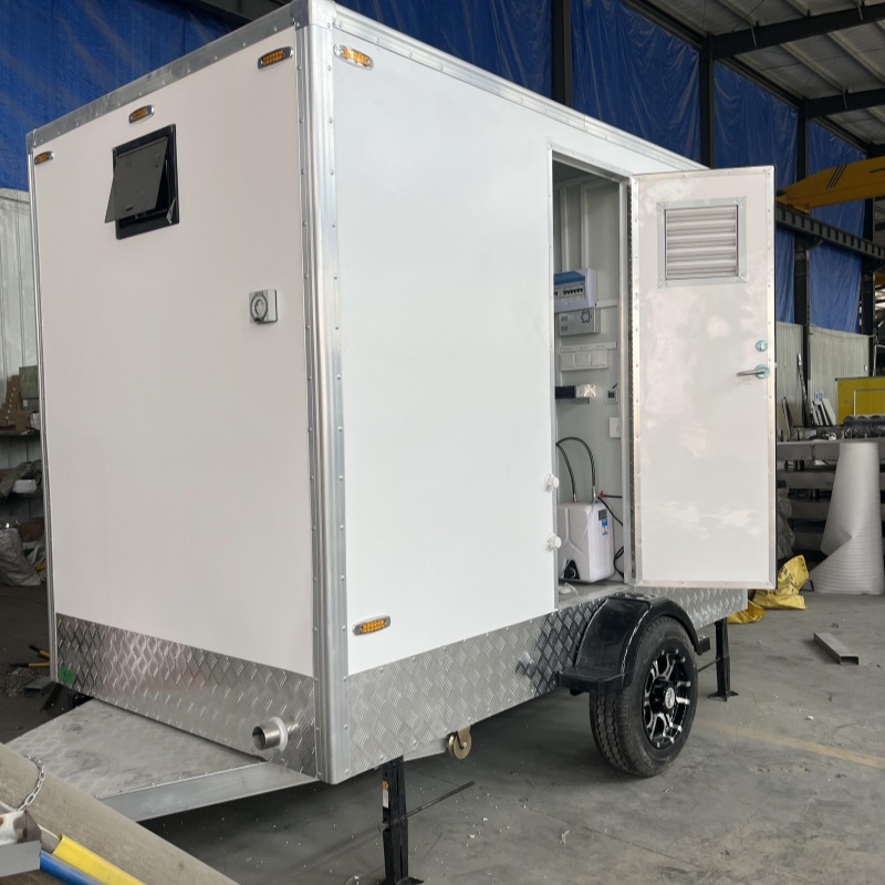 Two 3-meter portable toilet trailers