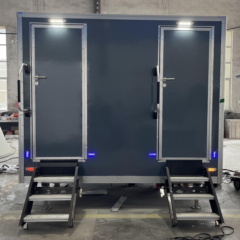 Mobile trailer with double toilet compartments and grey lightweight body