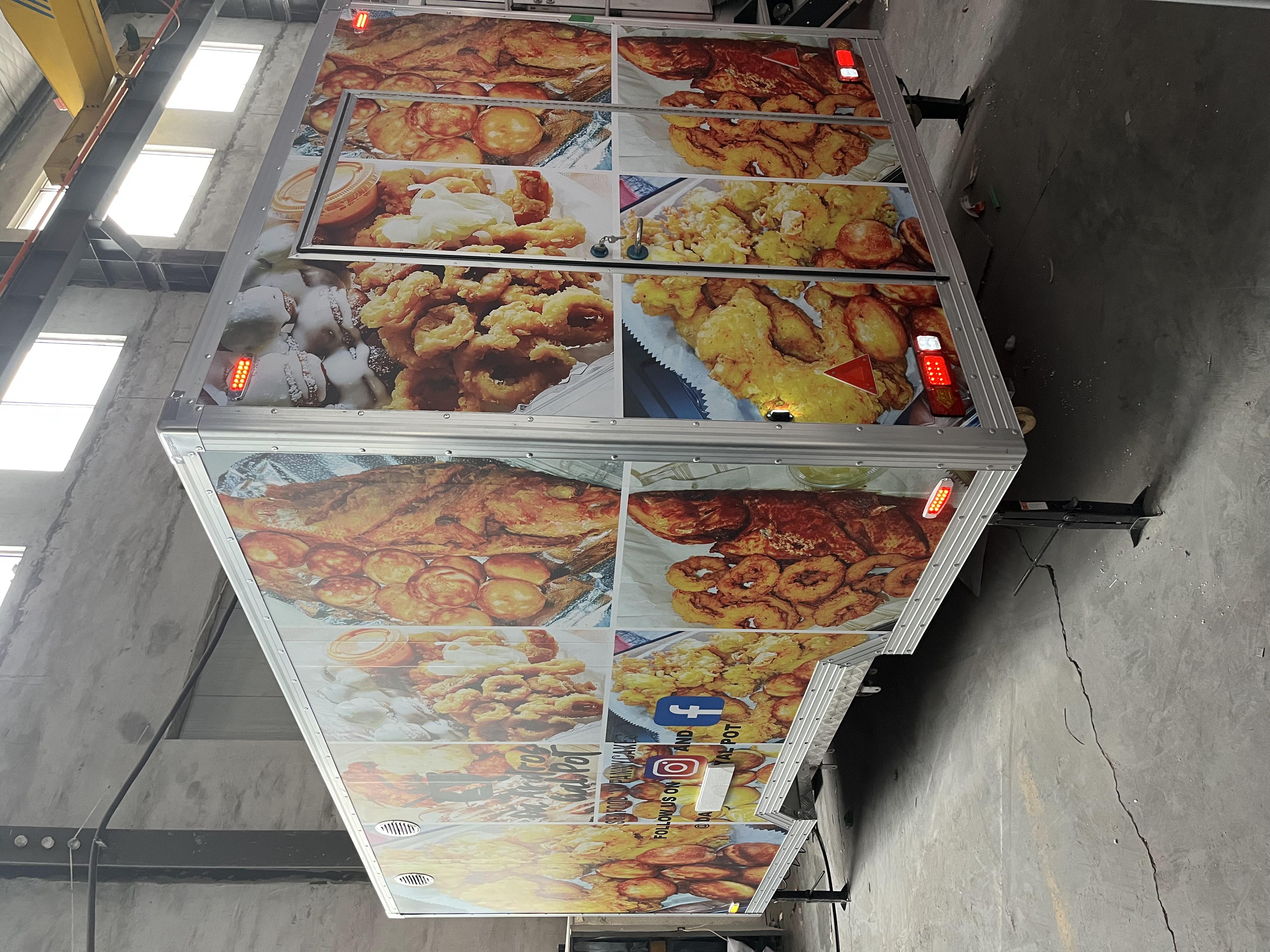 Fashionable yellow sticker trailer food truck, a new landmark of street trend food