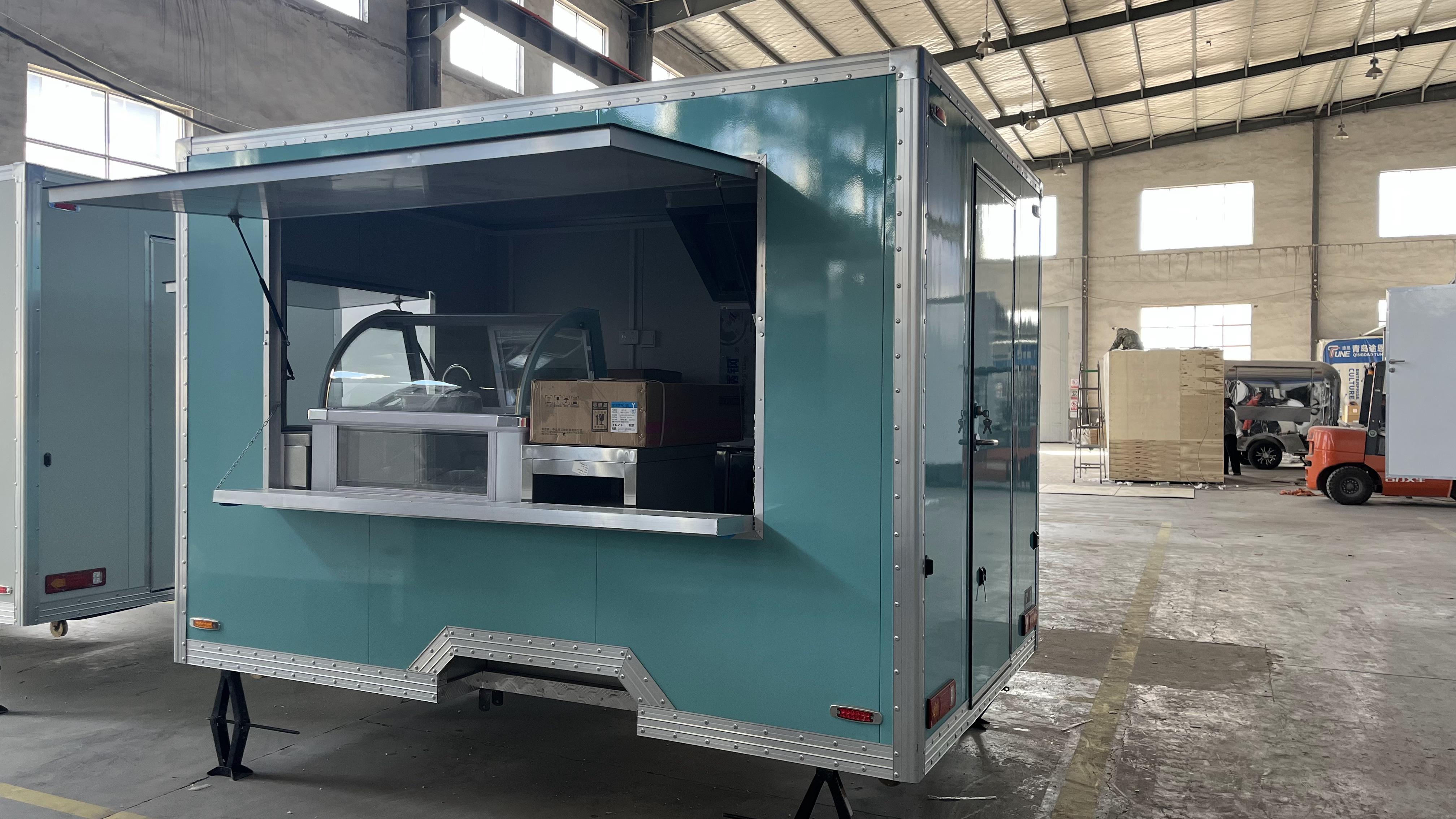 Blue-green retro food truck trailer