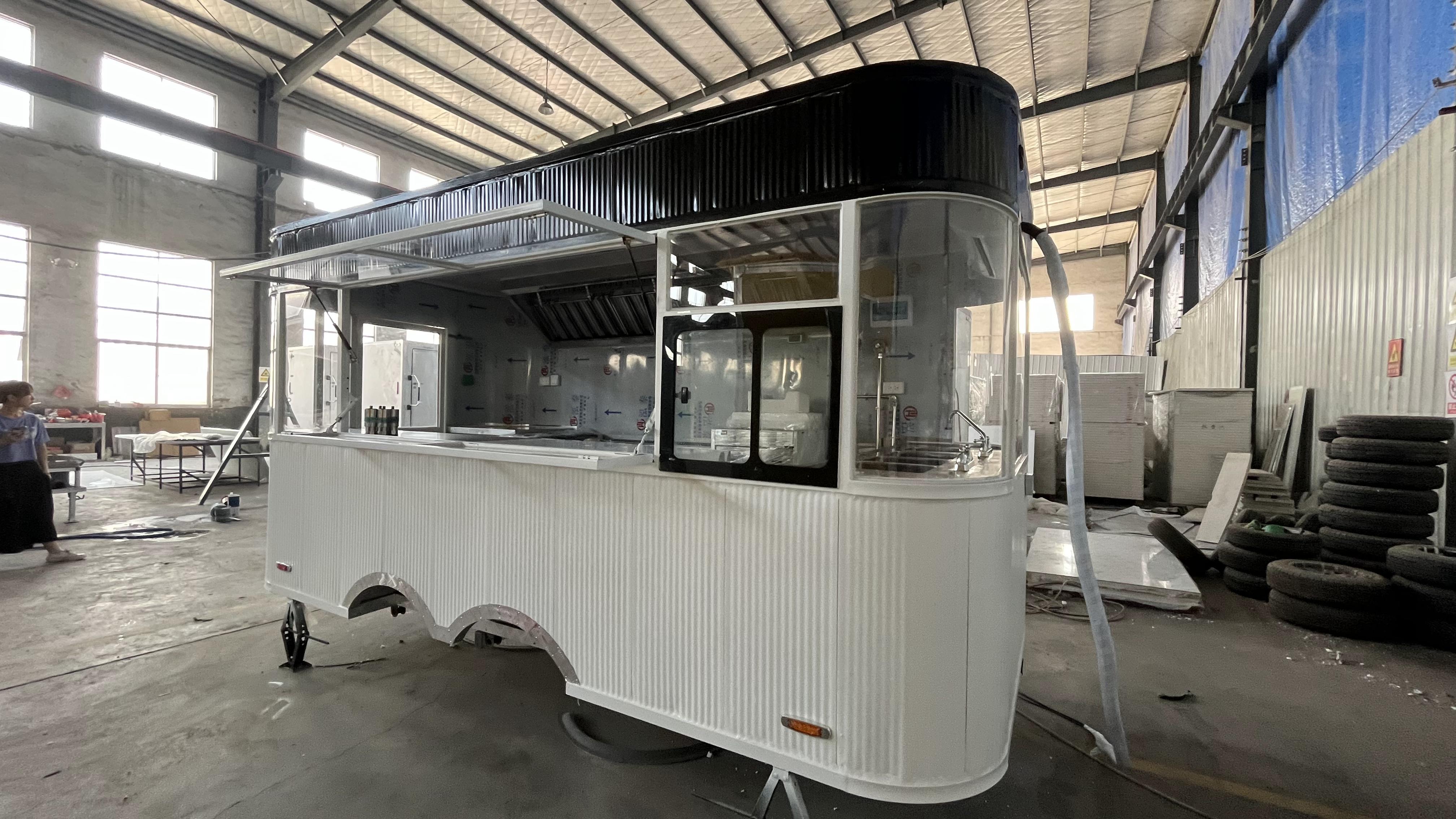 Street trend stalls · Black and White food trucks | Graffiti spray-painted bodies + outdoor camping chairs · Social mobile canteens for young people