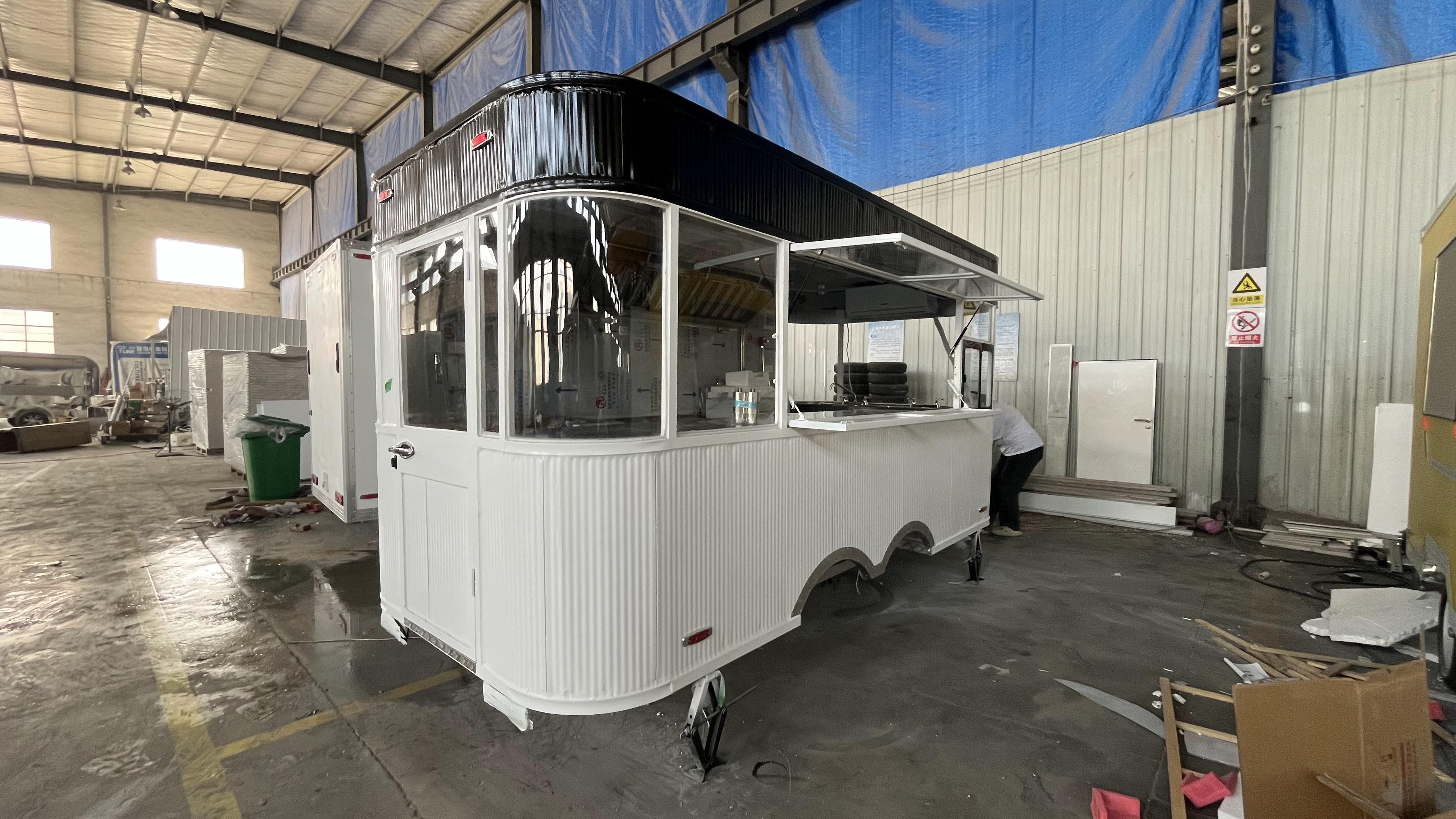 Street trend stalls · Black and White food trucks | Graffiti spray-painted bodies + outdoor camping chairs · Social mobile canteens for young people