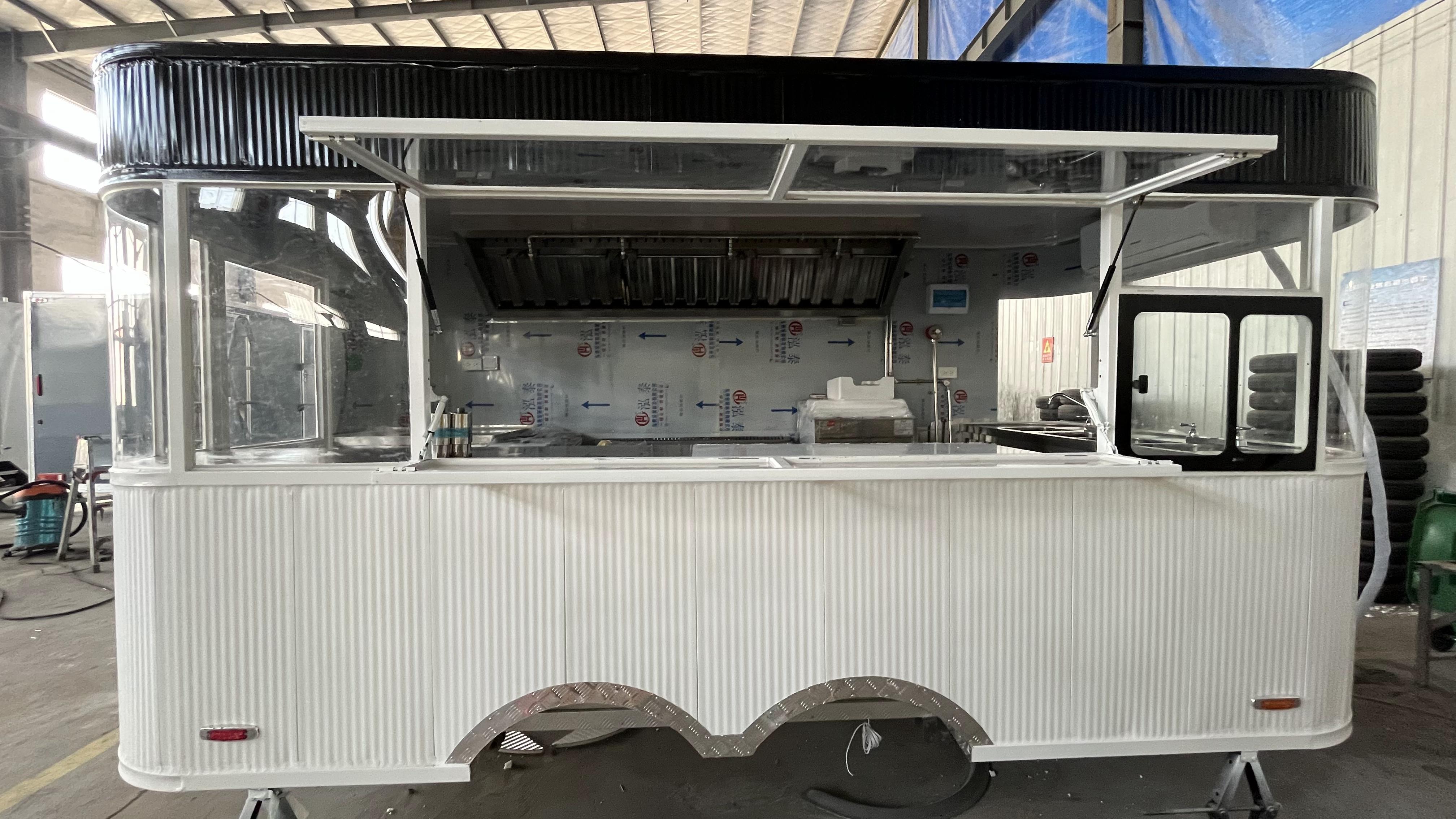 Street trend stalls · Black and White food trucks | Graffiti spray-painted bodies + outdoor camping chairs · Social mobile canteens for young people