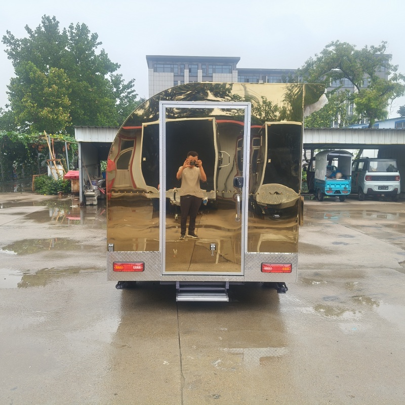 The eye-catching golden mirror food truck, a mobile snack business trailer, is a powerful tool for starting a business and setting up a stall