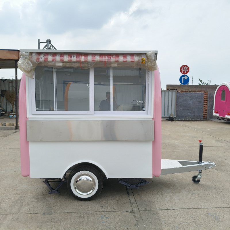 The pink and white cute food truck is the ideal choice for a mobile snack shop