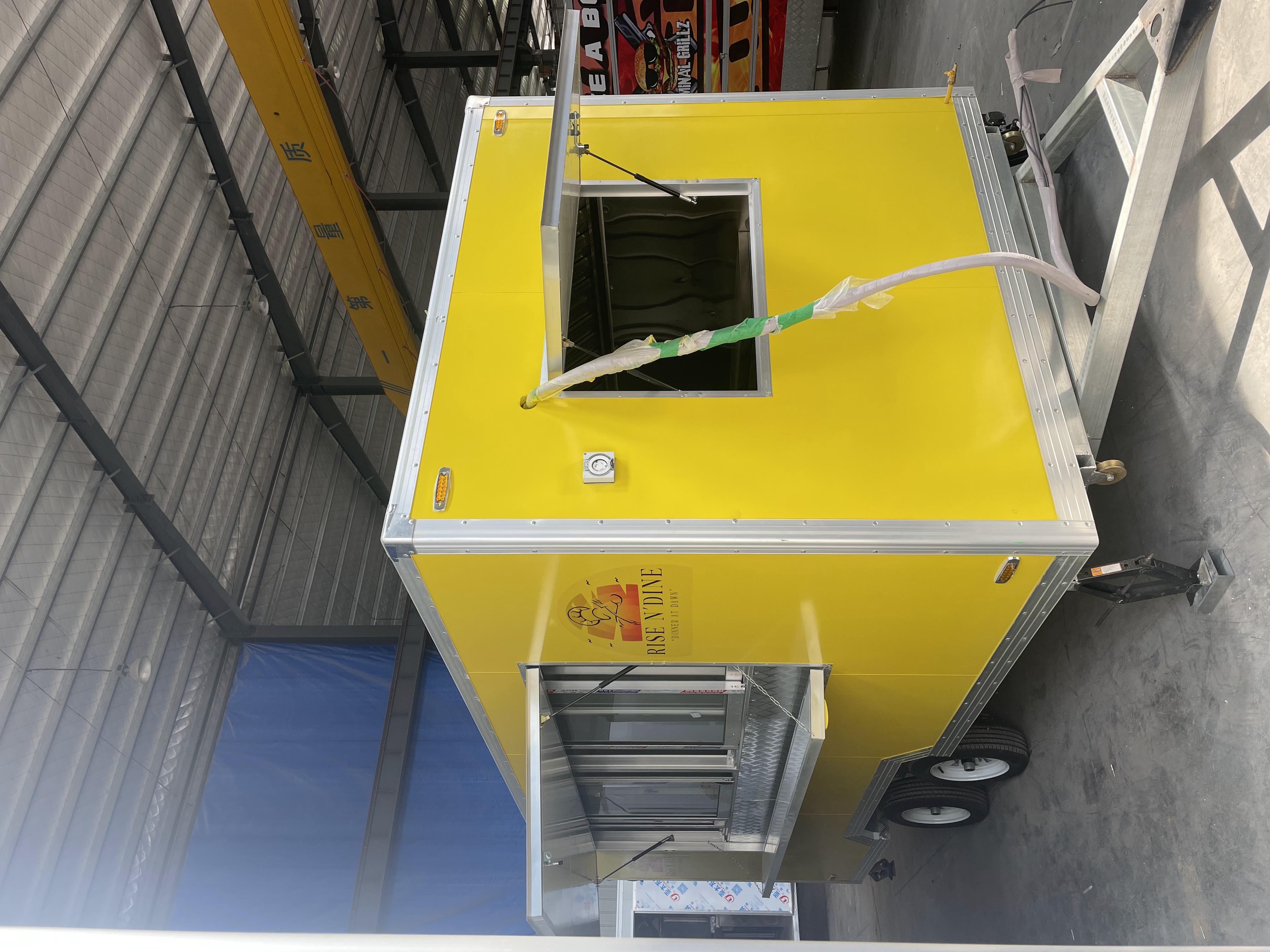 "RISE N DINE" yellow food cart mobile catering operation equipment