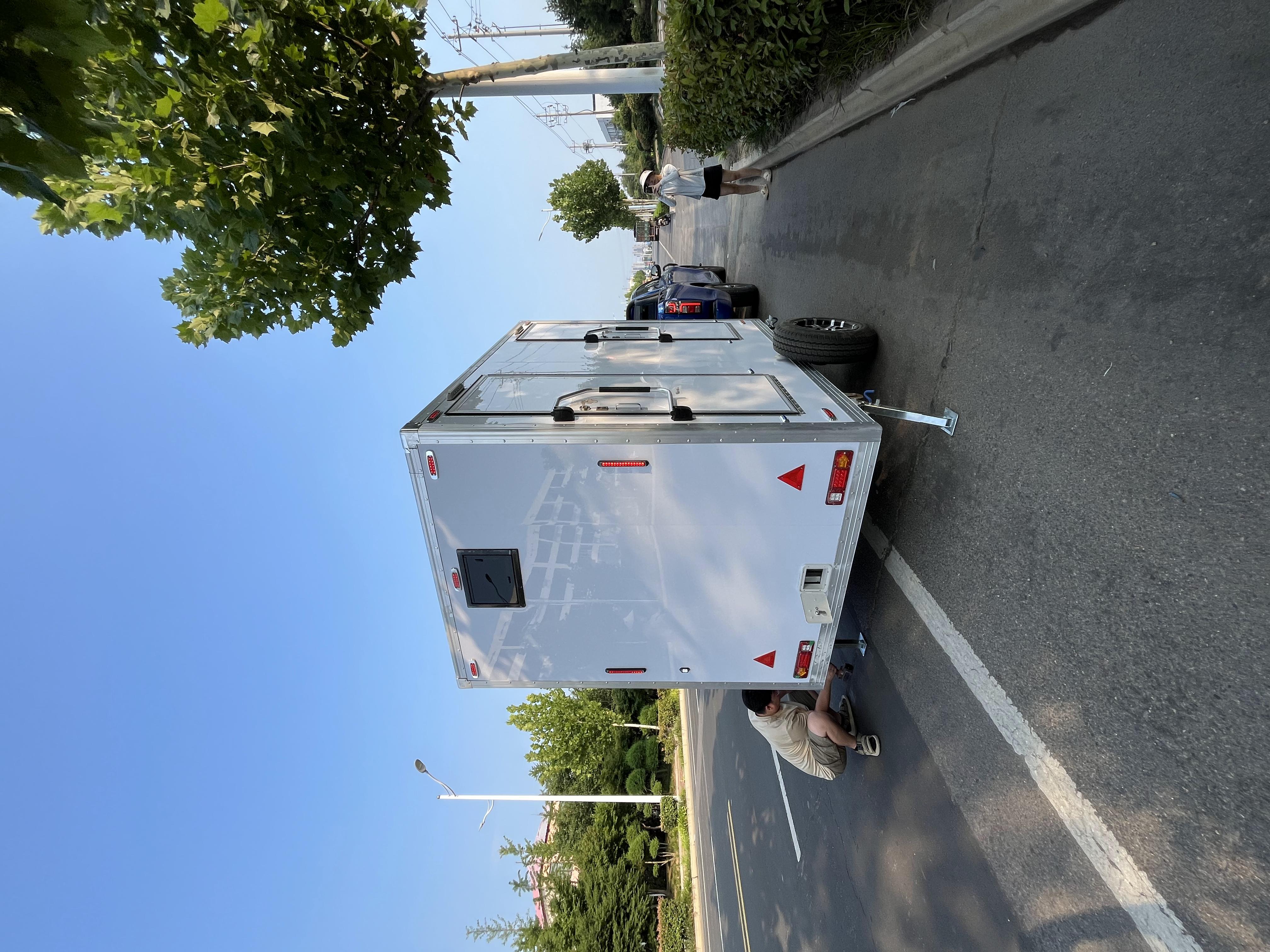 Portable and hygienic solution for construction sites and exhibitions with two trailer-mounted toilets