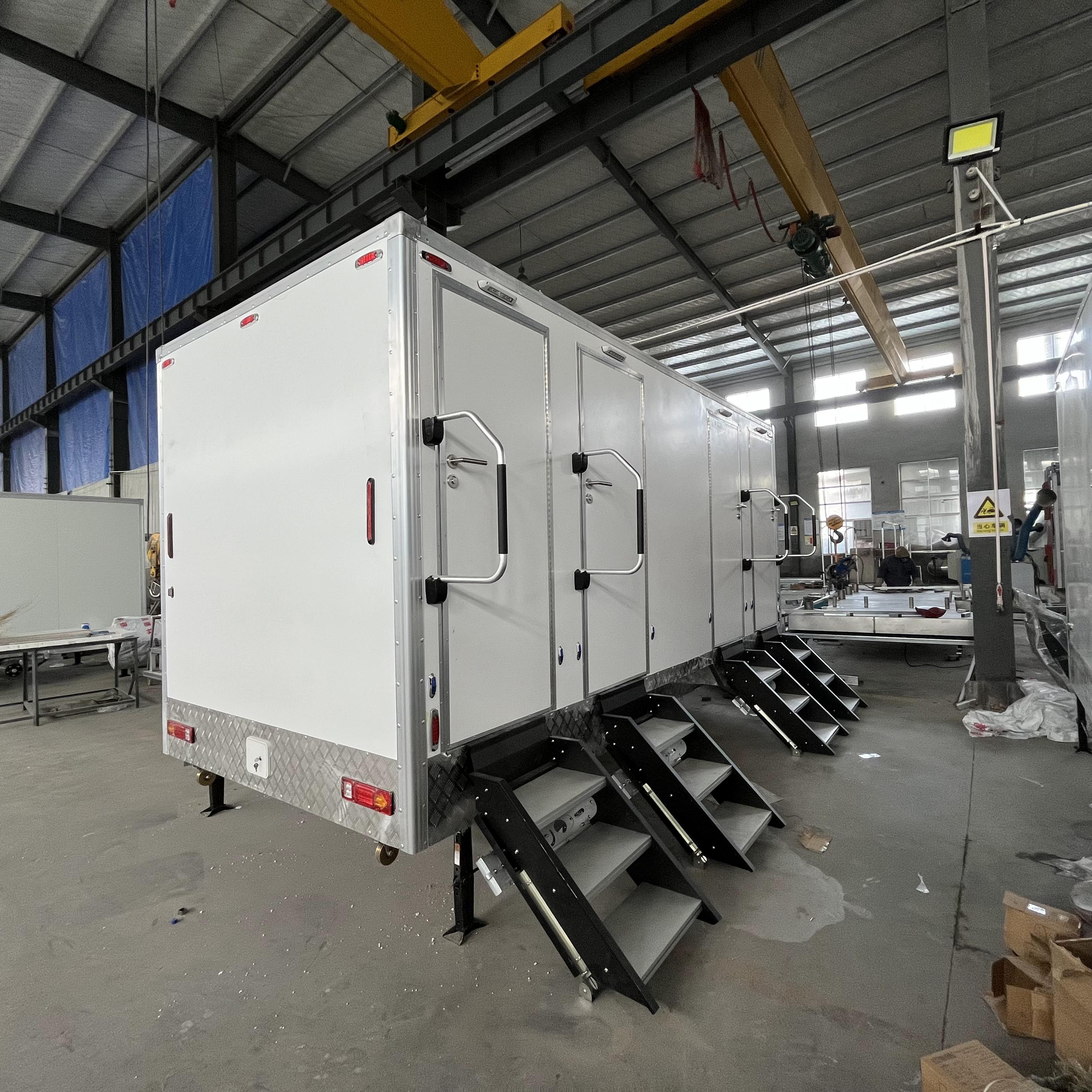Four trailer-mounted mobile toilets, the preferred choice for temporary toilet use in tourist attractions