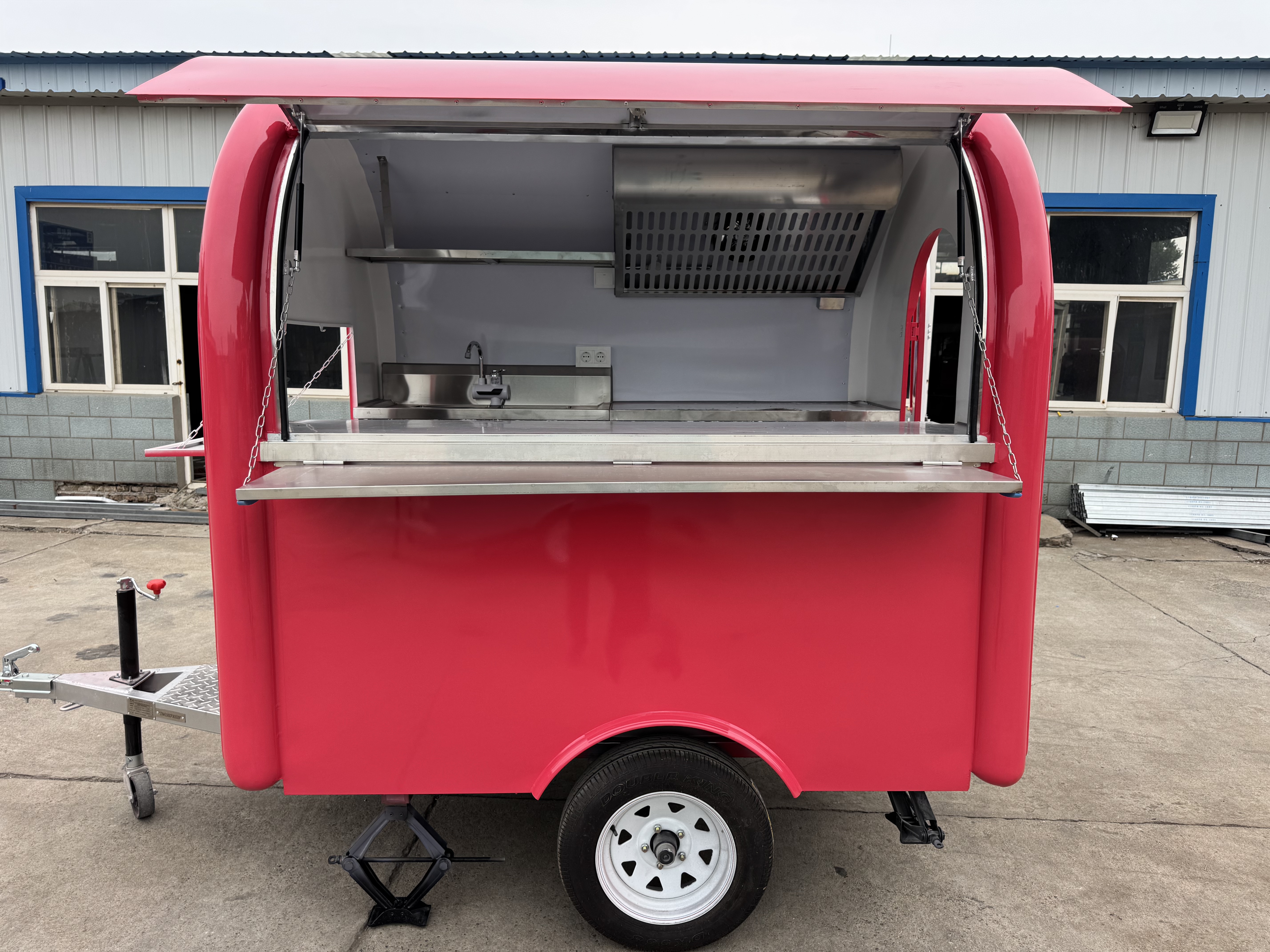 Red towable mobile food truck for starting a food stall