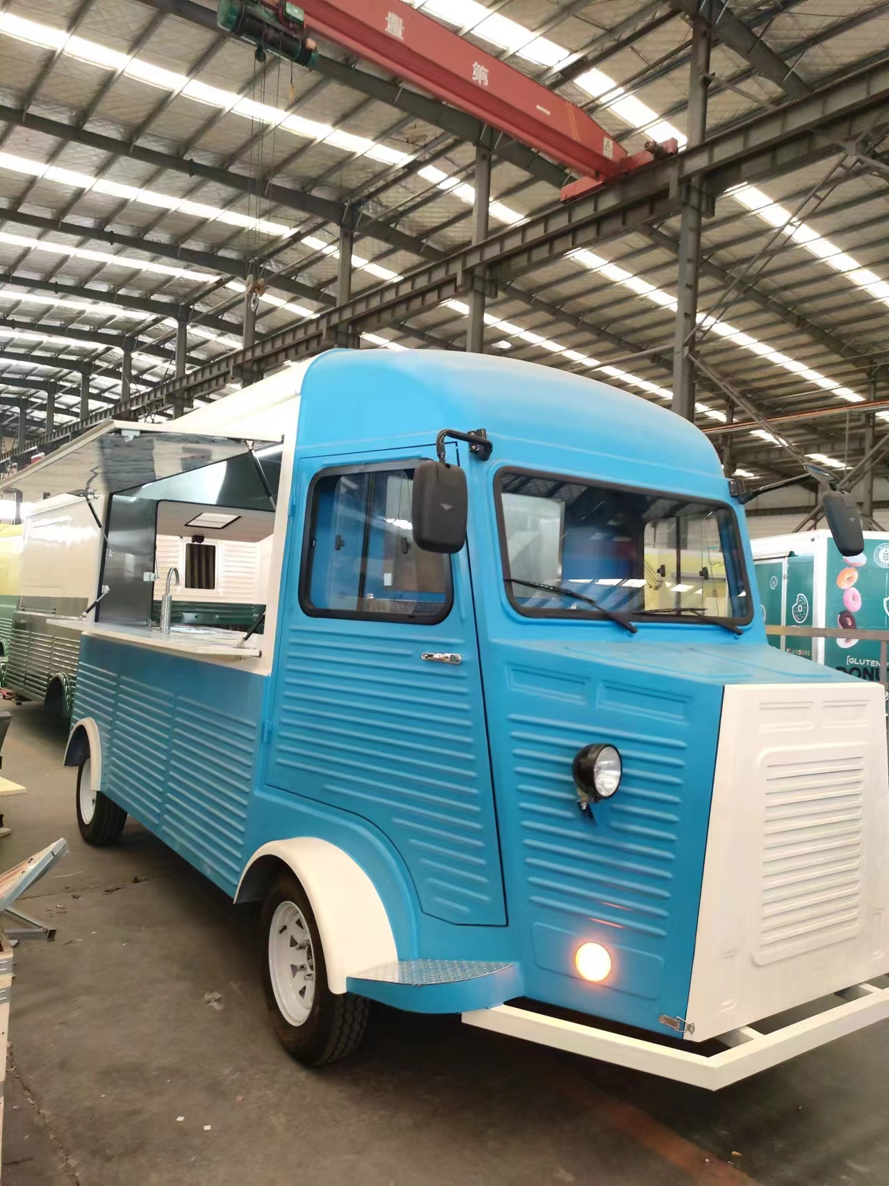 The refreshing blue and white color-matched food truck is an eye-catching carrier of delicious food on every street corner