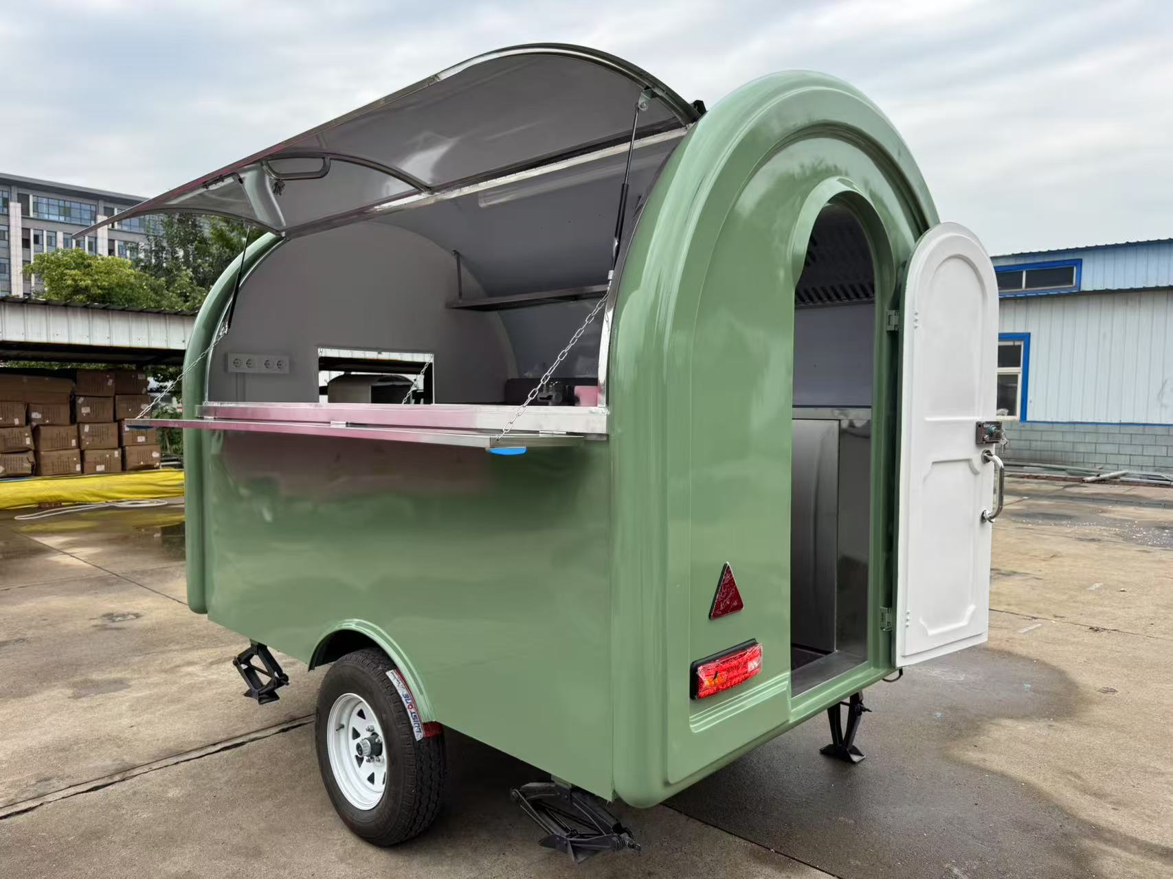 Fresh green trailer-mounted food truck, mobile catering stall truck, outdoor business mobile store