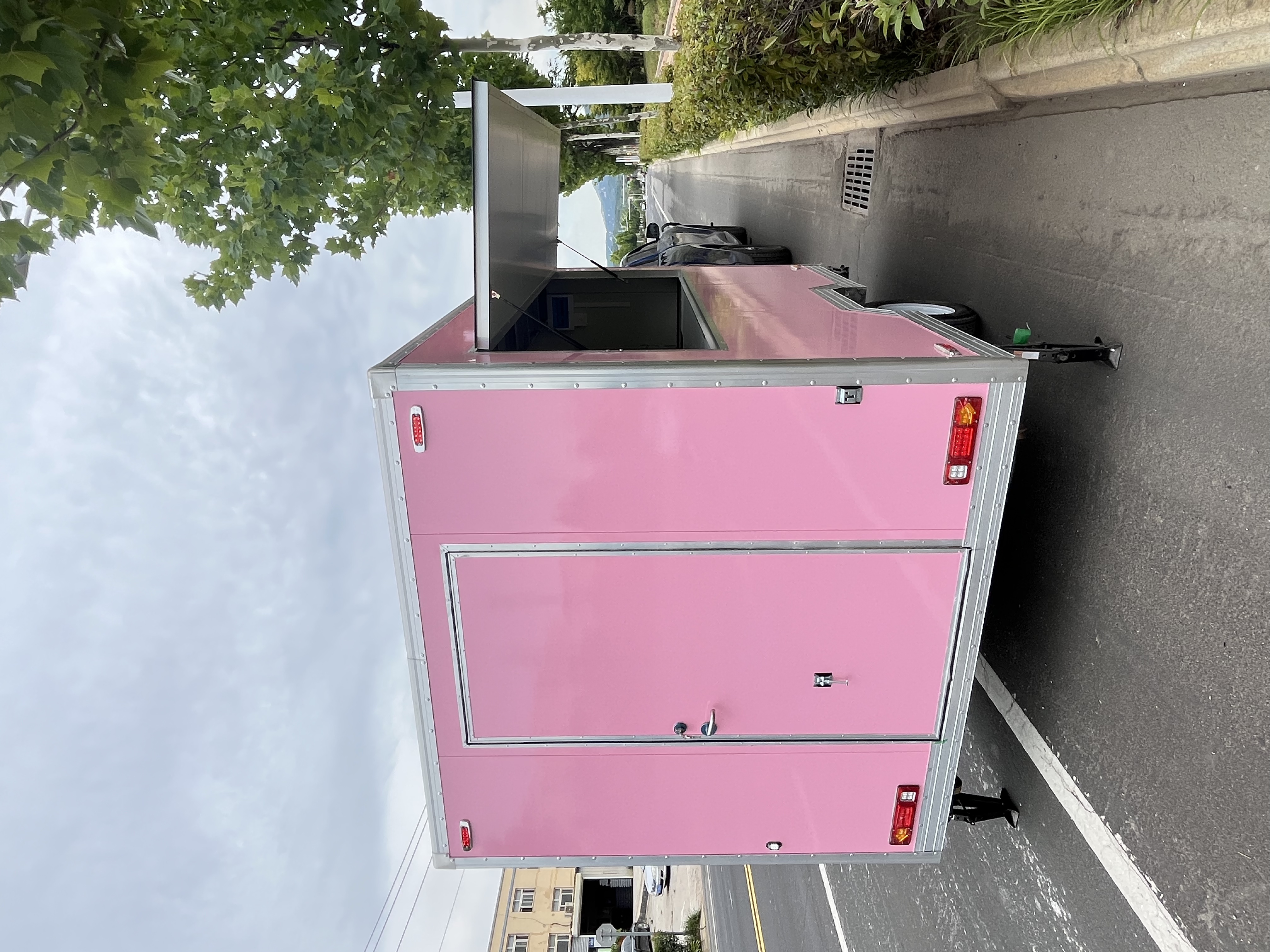 The pink mobile food truck, an outdoor mobile business trailer, is a must-have for selling snacks and beverages