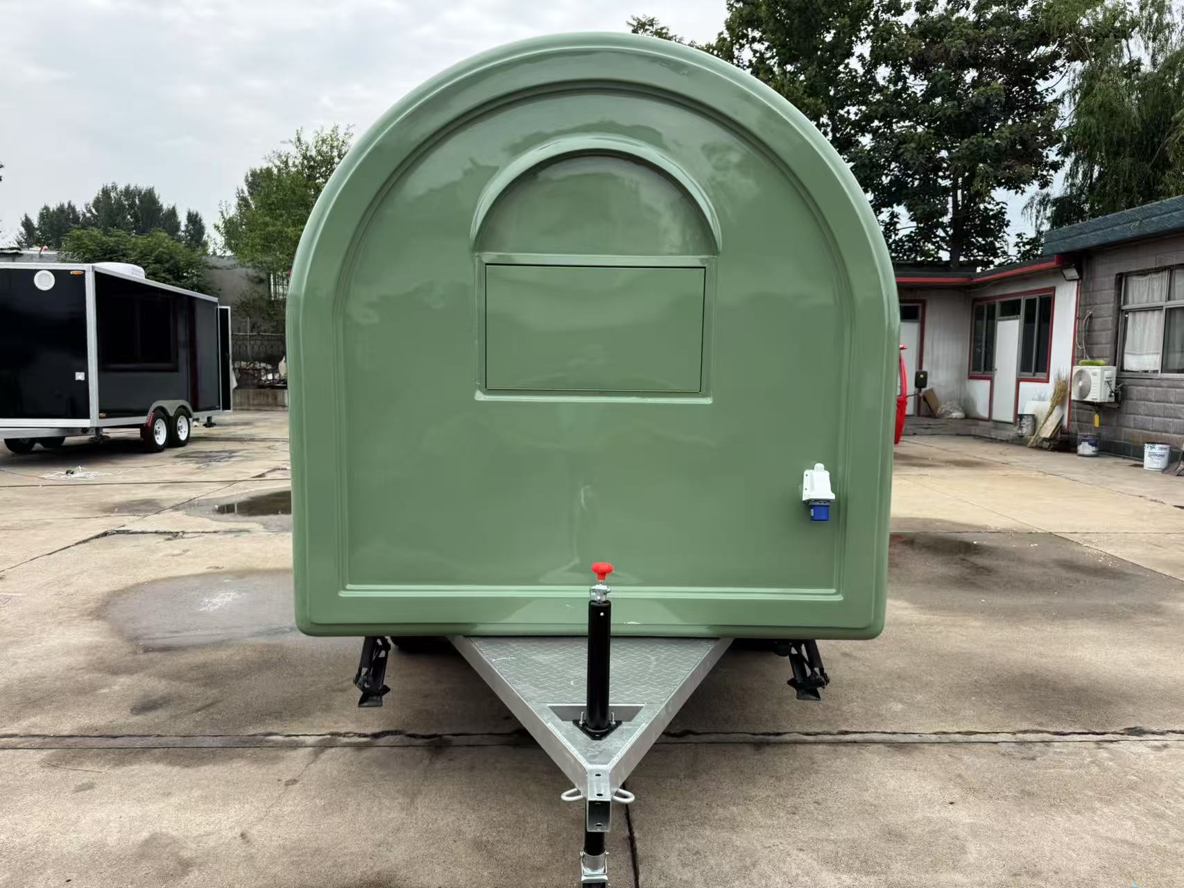 Fresh green trailer-mounted food truck, mobile catering stall truck, outdoor business mobile store
