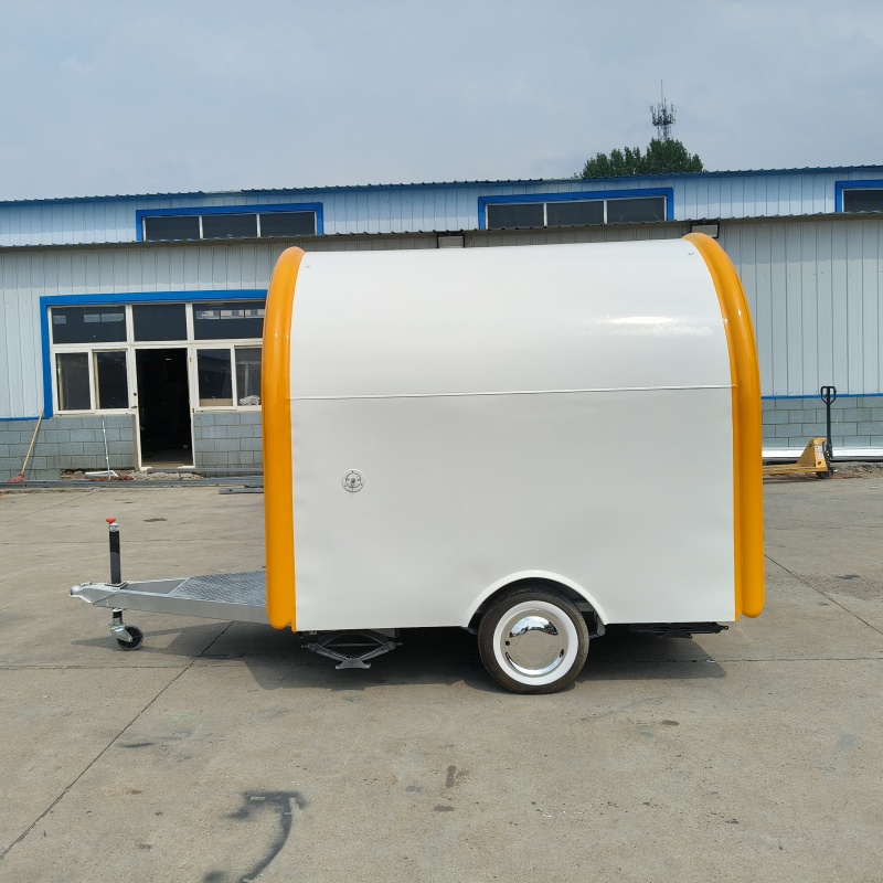 The yellow and white color scheme fashionable food truck is a mobile catering business start-up equipment and a convenient mobile vending cart
