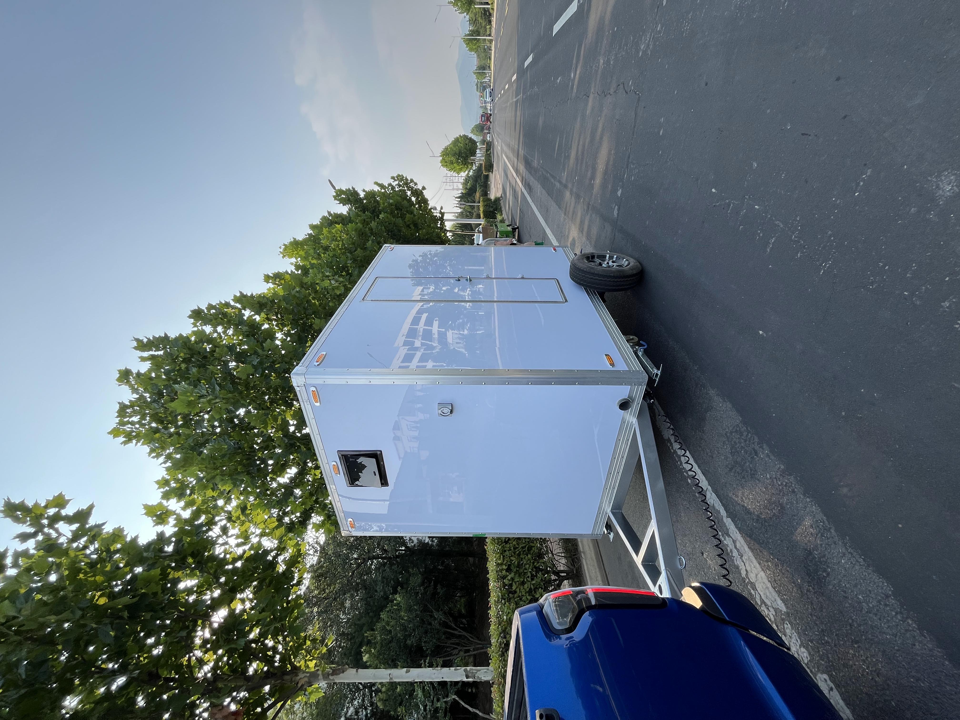Portable and hygienic solution for construction sites and exhibitions with two trailer-mounted toilets