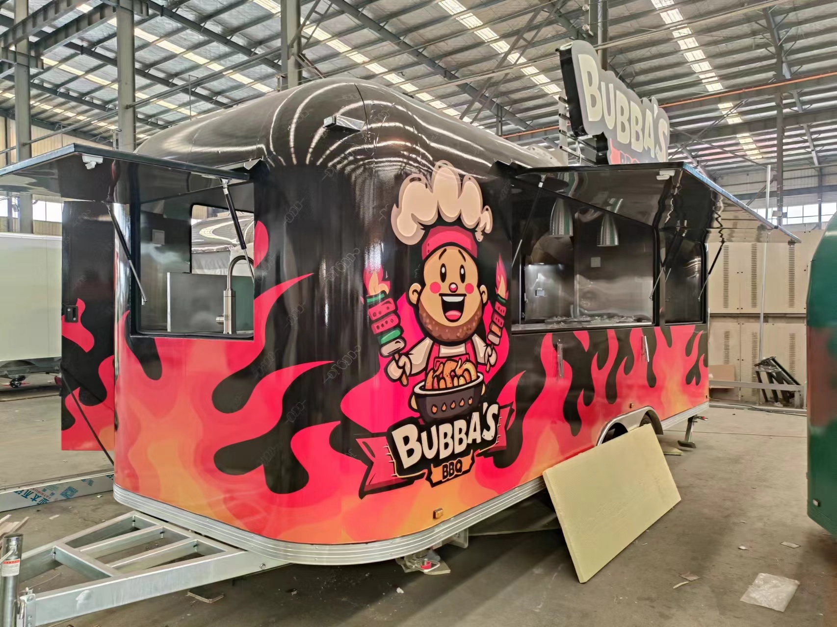 The classic black and red color scheme with patterns food truck is a must-have for mobile shops