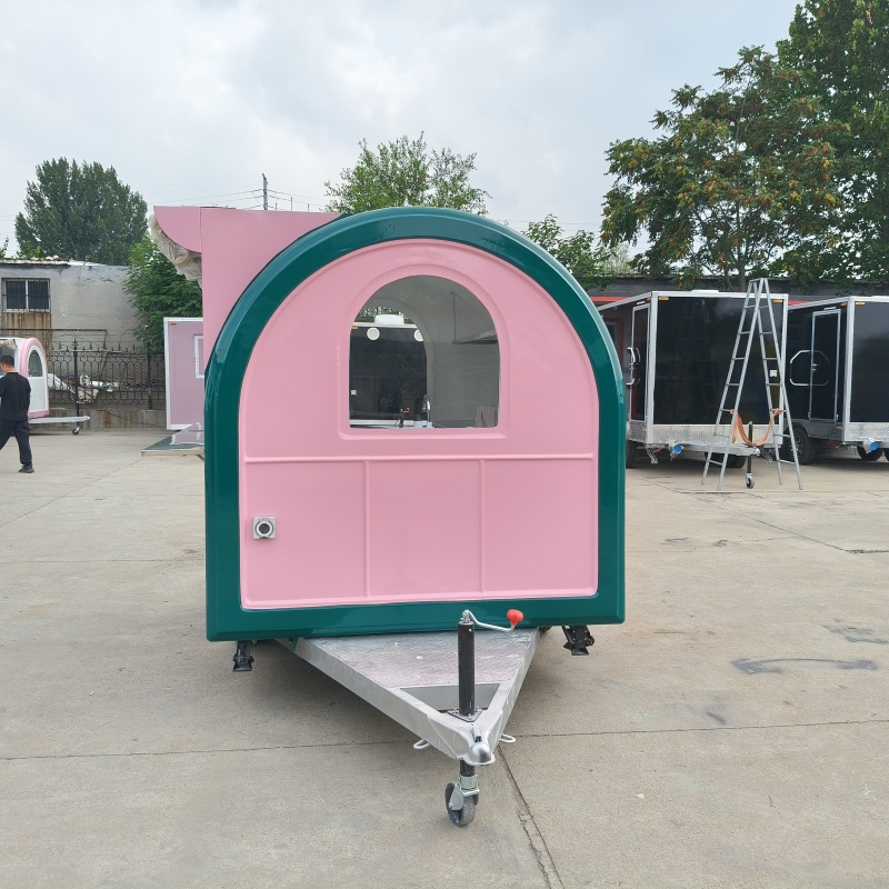 The pink and green circular food truck, a mobile business food truck, is a popular food check-in stall
