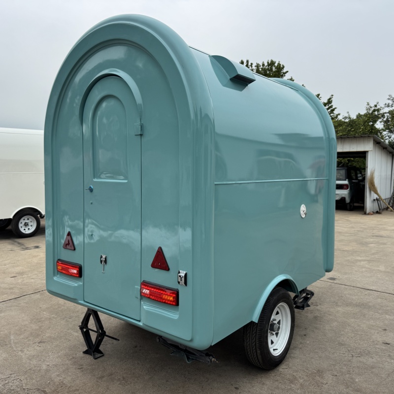 The light blue mobile food truck is a flexible choice for convenient towing in the catering business