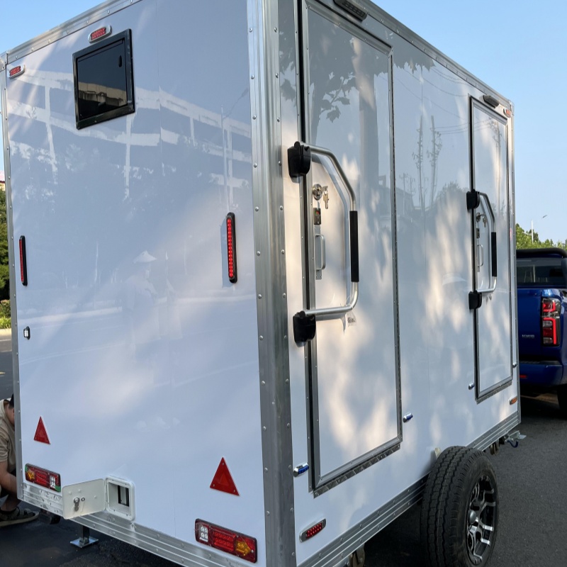 Portable and hygienic solution for construction sites and exhibitions with two trailer-mounted toilets