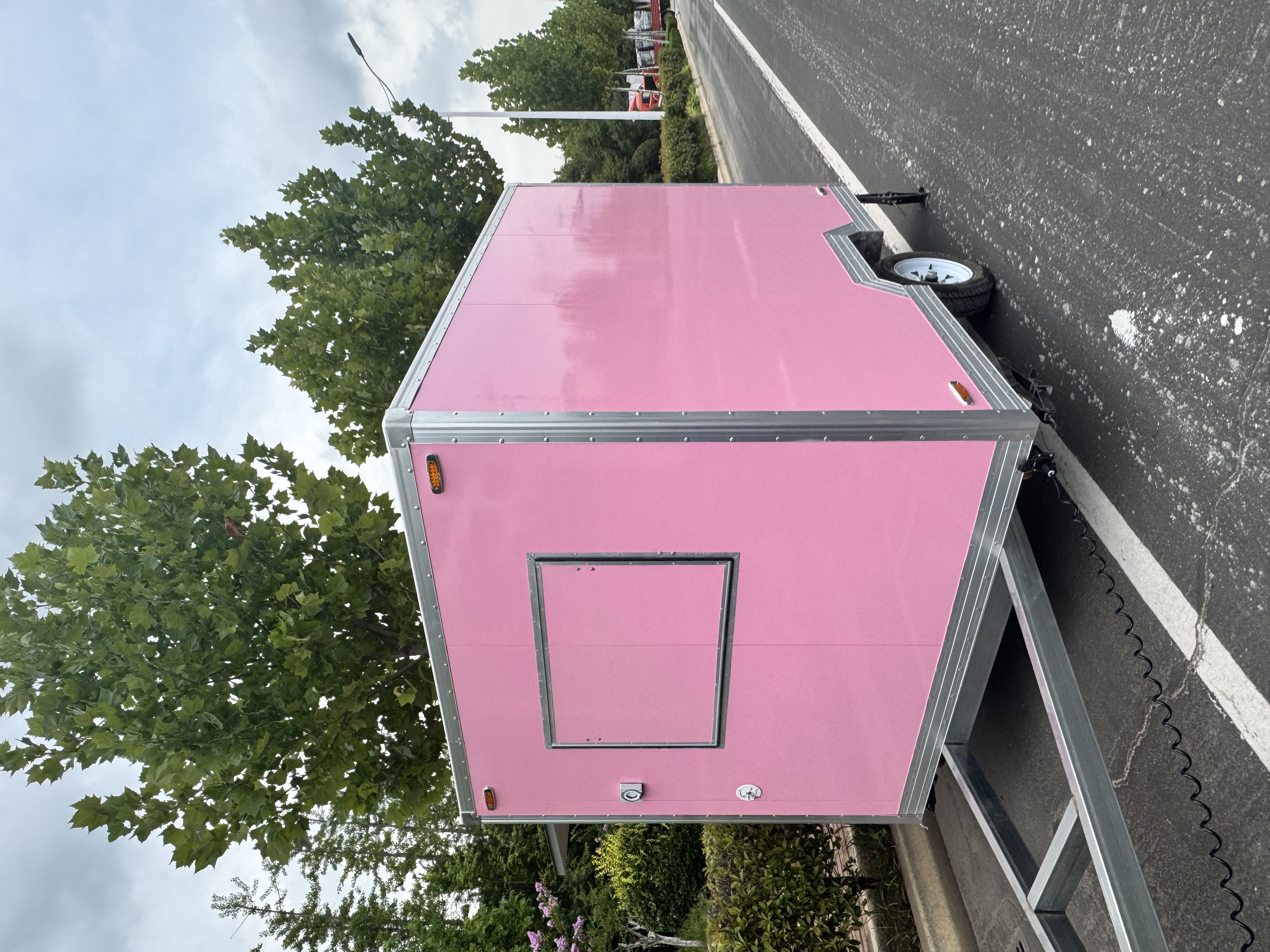 The pink mobile food truck, an outdoor mobile business trailer, is a must-have for selling snacks and beverages