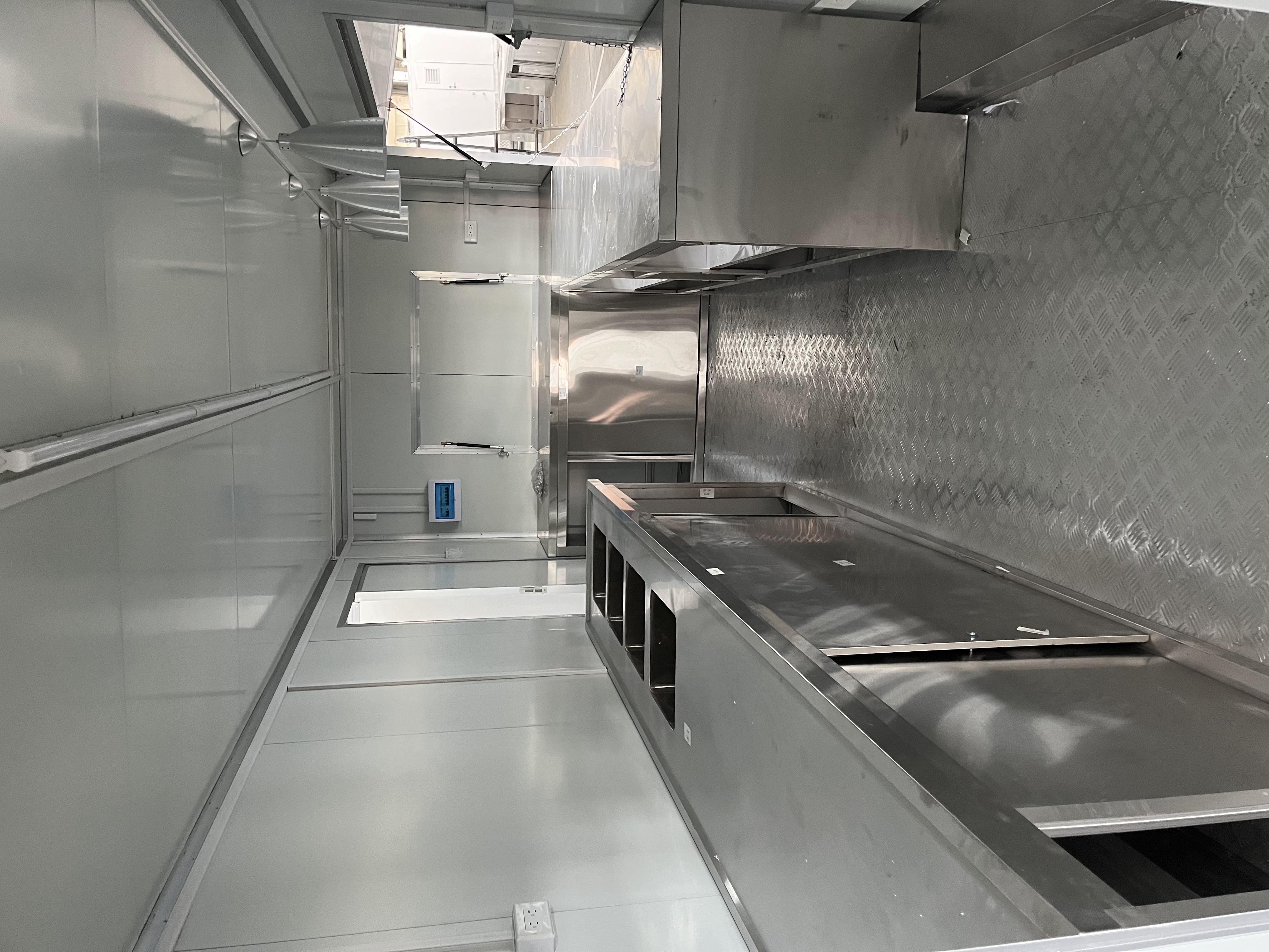 The fashionable blue pavilion food truck creates a trendy street scene