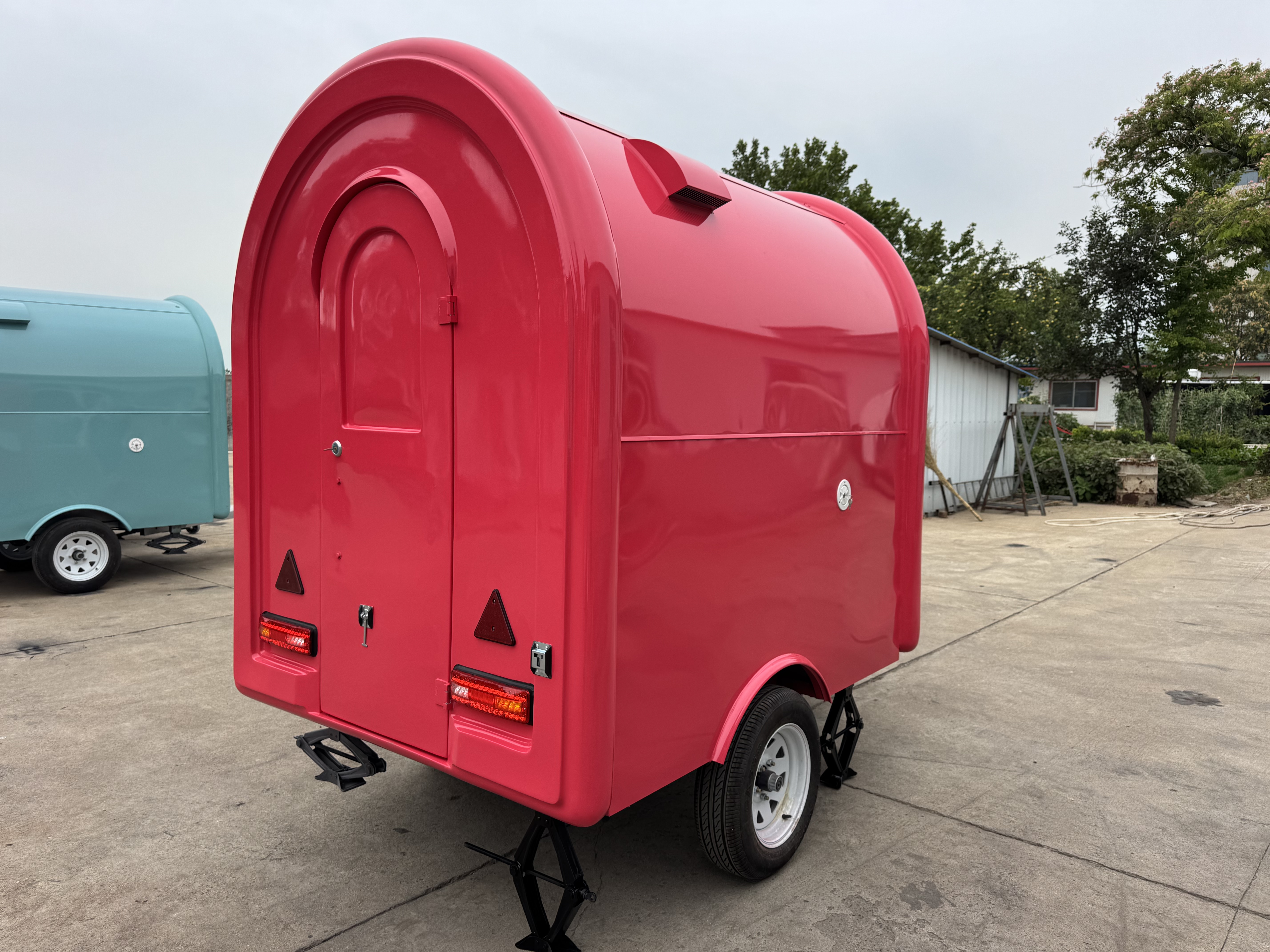 Red towable mobile food truck for starting a food stall
