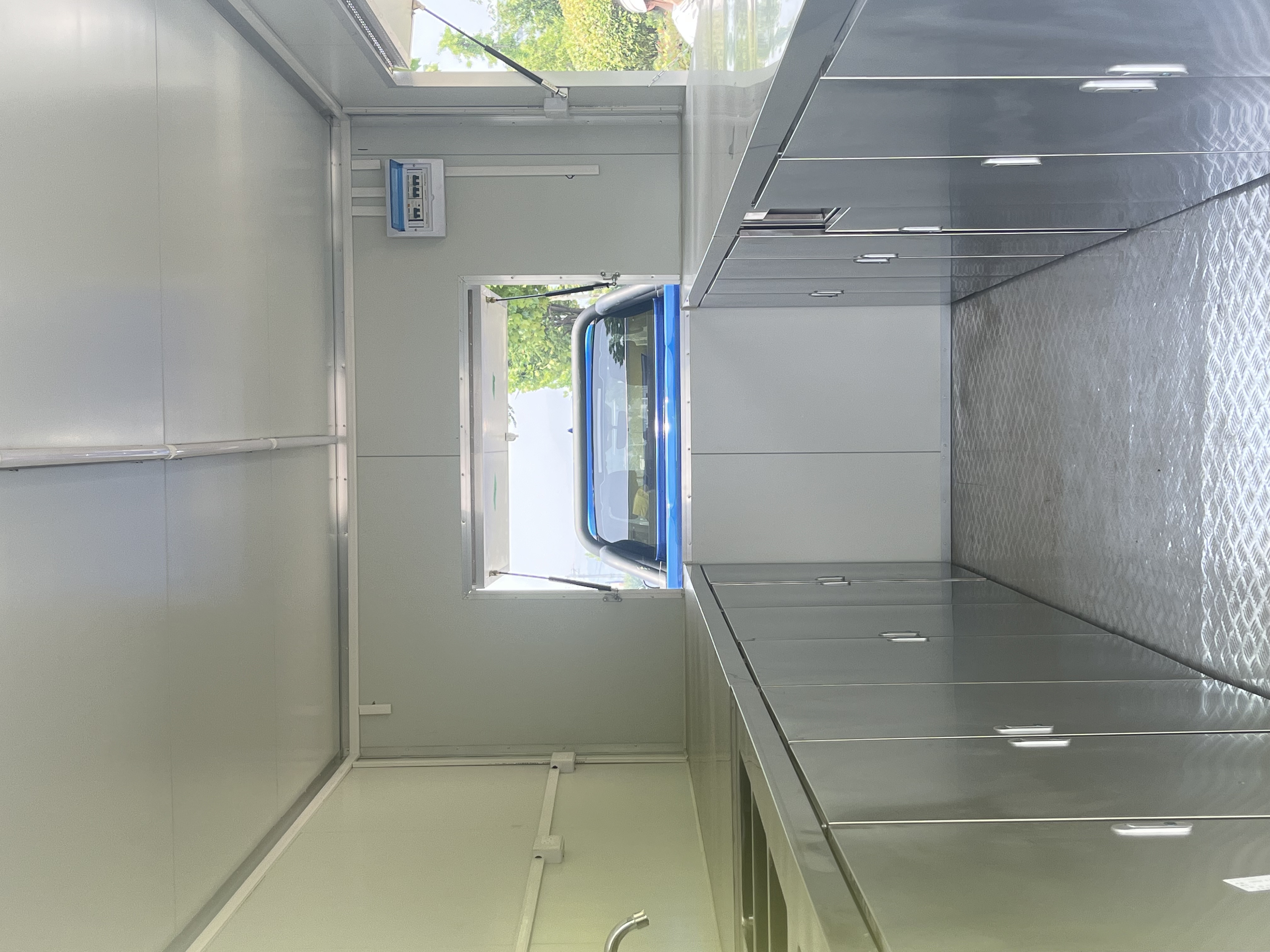 Light green portable and mobile food truck trailer, a great helper for setting up stalls and camping