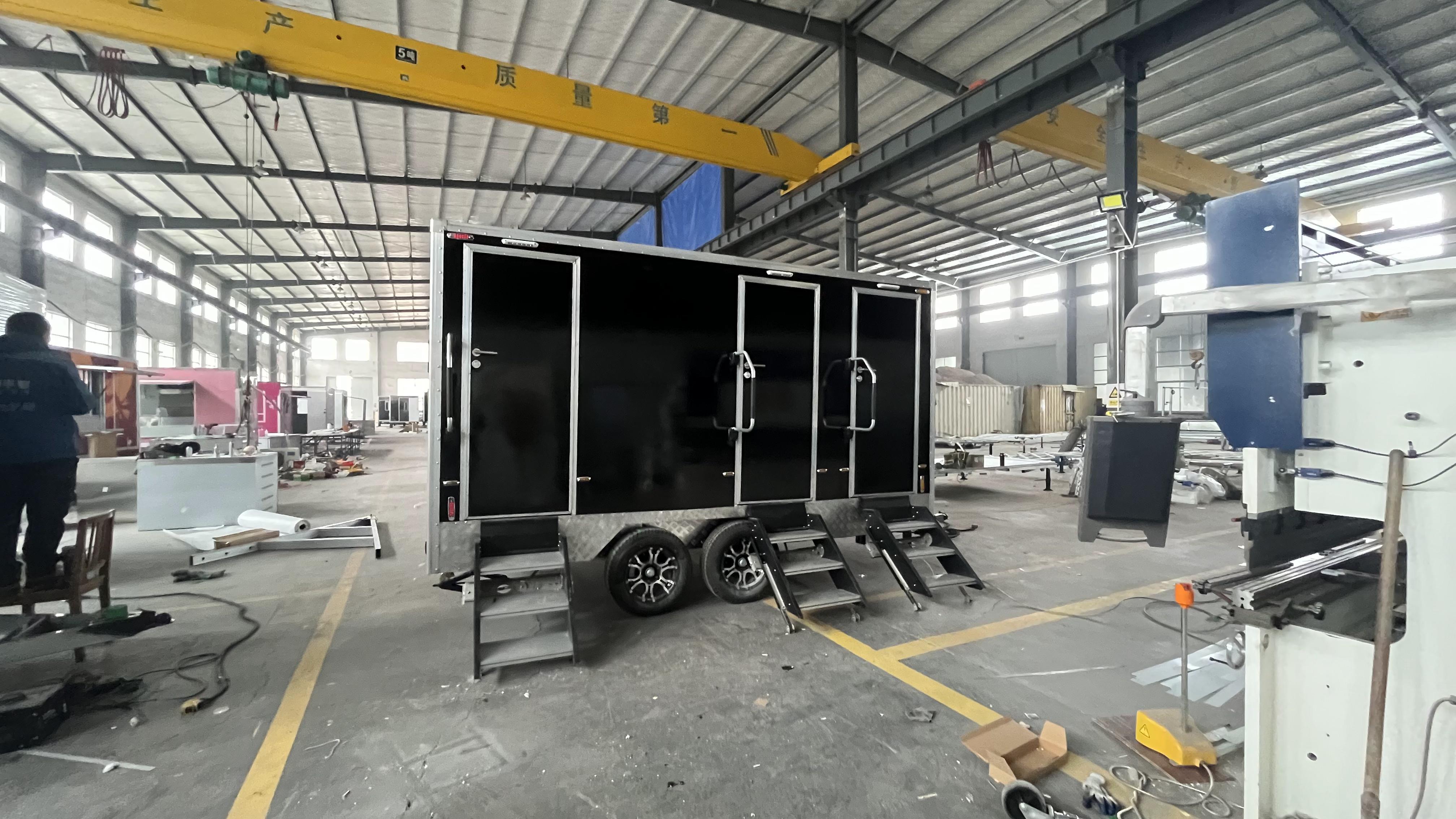 Black double/triple outdoor mobile toilets