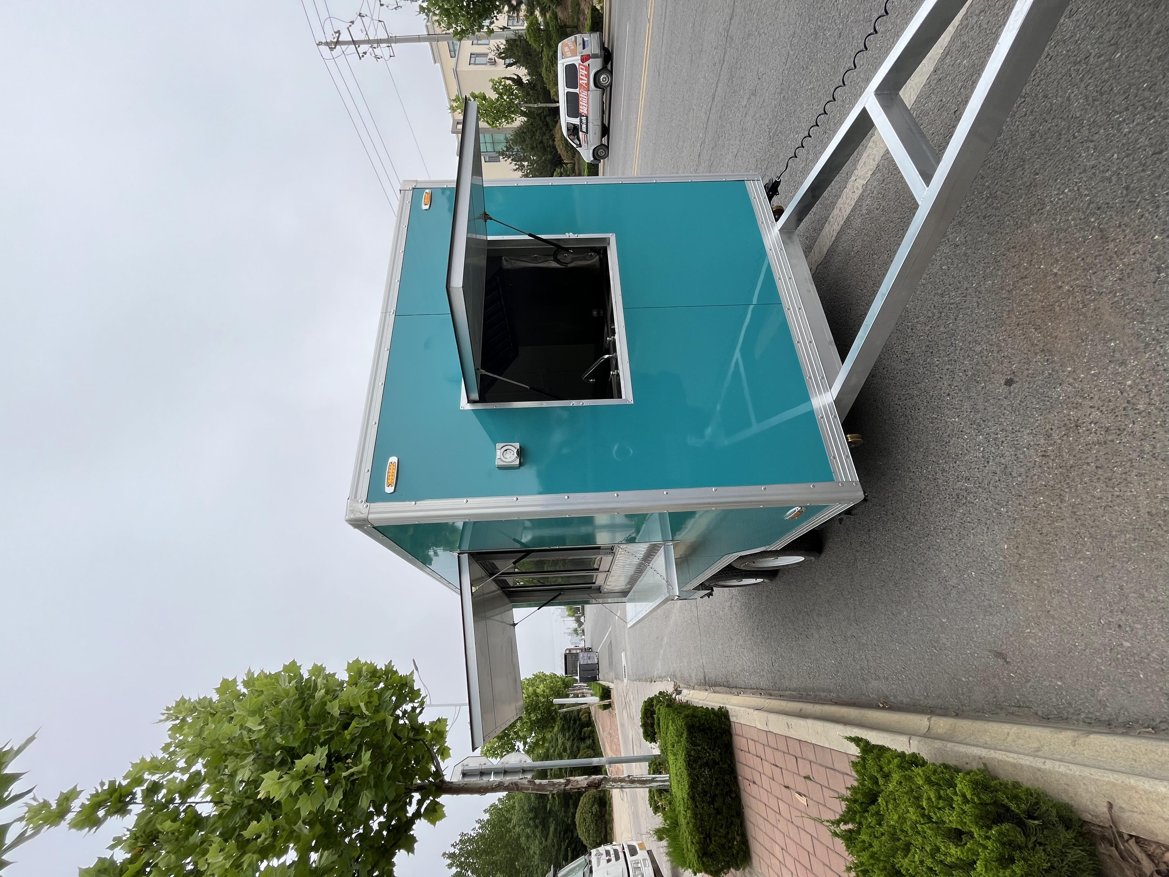 Customized blue-green mobile food truck with sunshade window, a great helper for mobile business operations